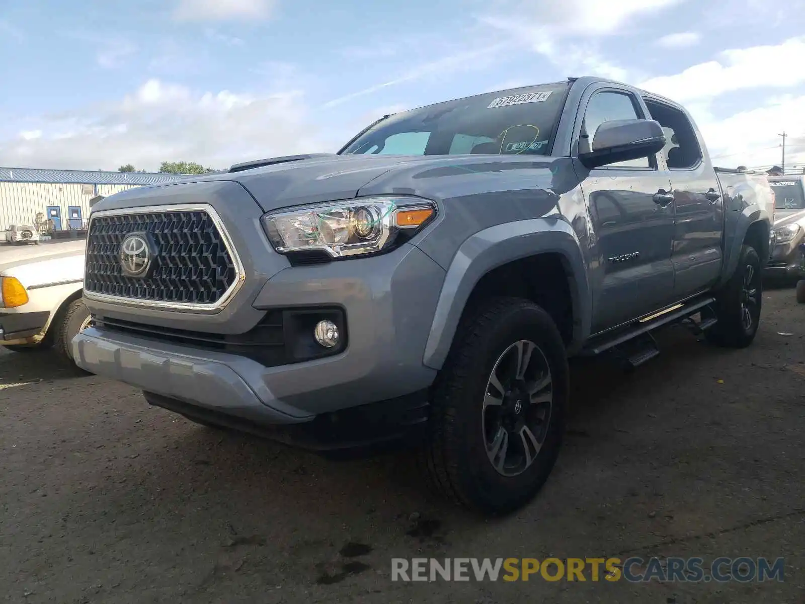 2 Photograph of a damaged car 5TFCZ5AN7KX181554 TOYOTA TACOMA 2019