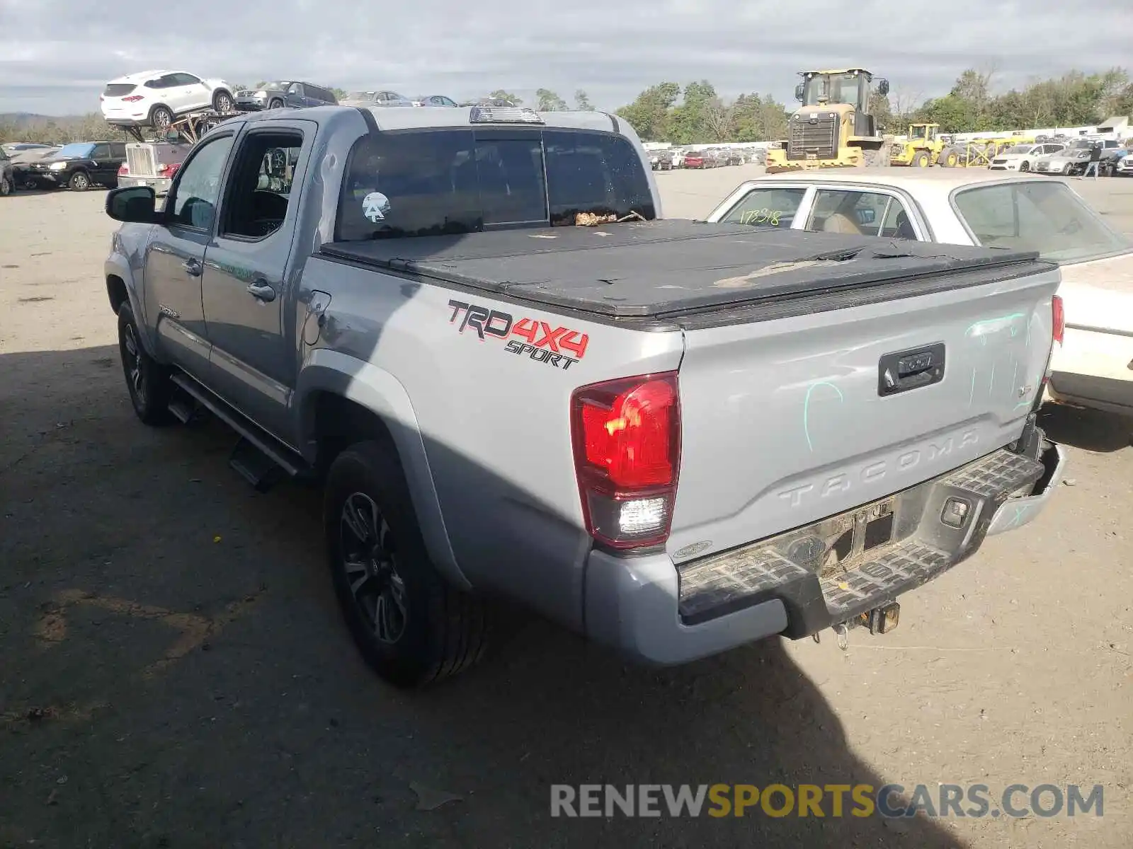 3 Photograph of a damaged car 5TFCZ5AN7KX181554 TOYOTA TACOMA 2019