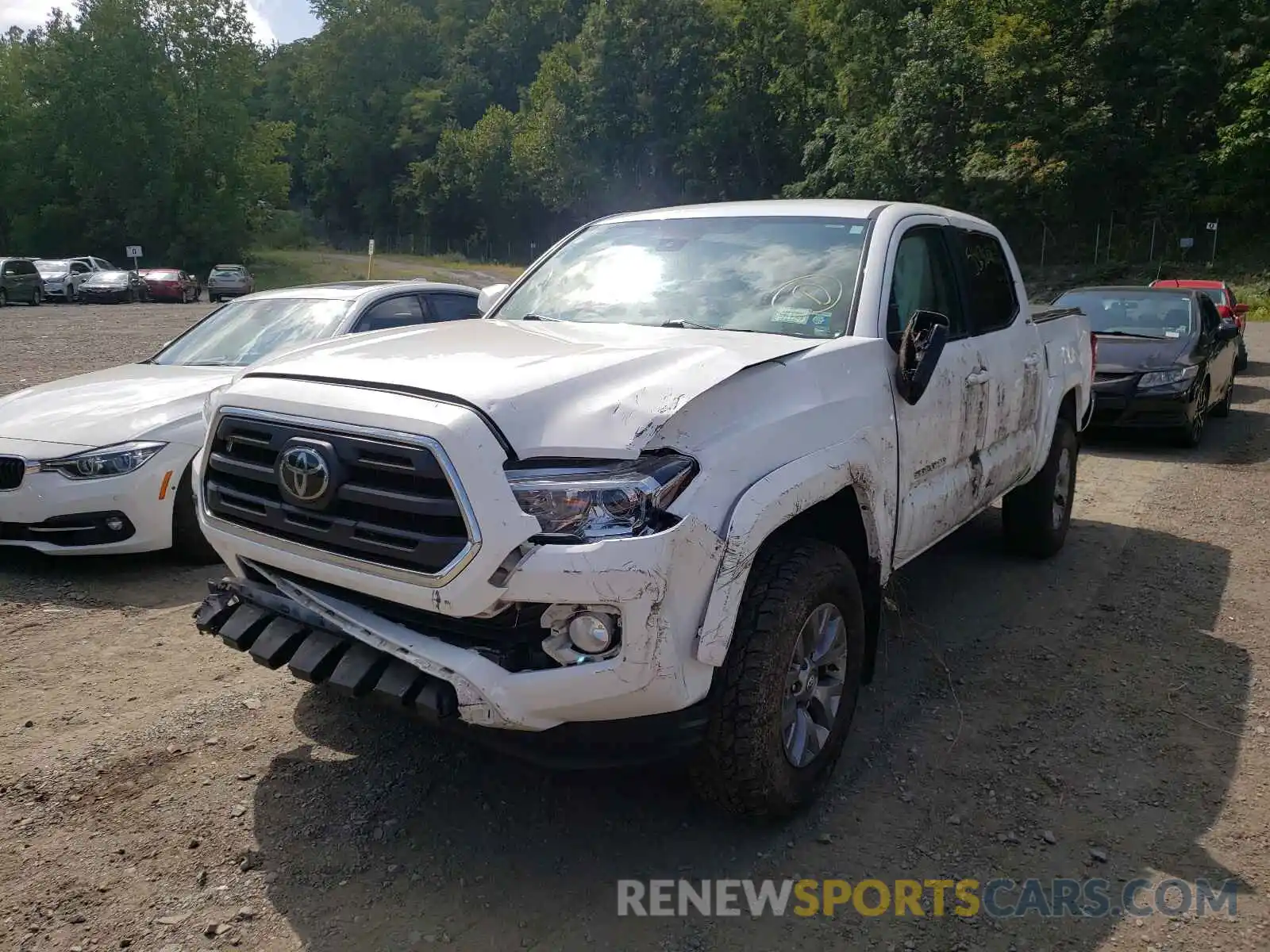 2 Photograph of a damaged car 5TFCZ5AN7KX183000 TOYOTA TACOMA 2019