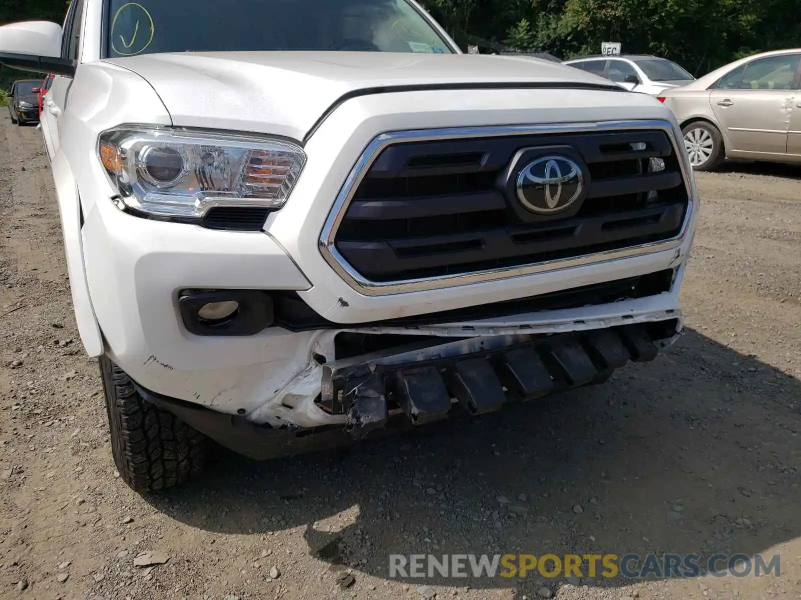 9 Photograph of a damaged car 5TFCZ5AN7KX183000 TOYOTA TACOMA 2019