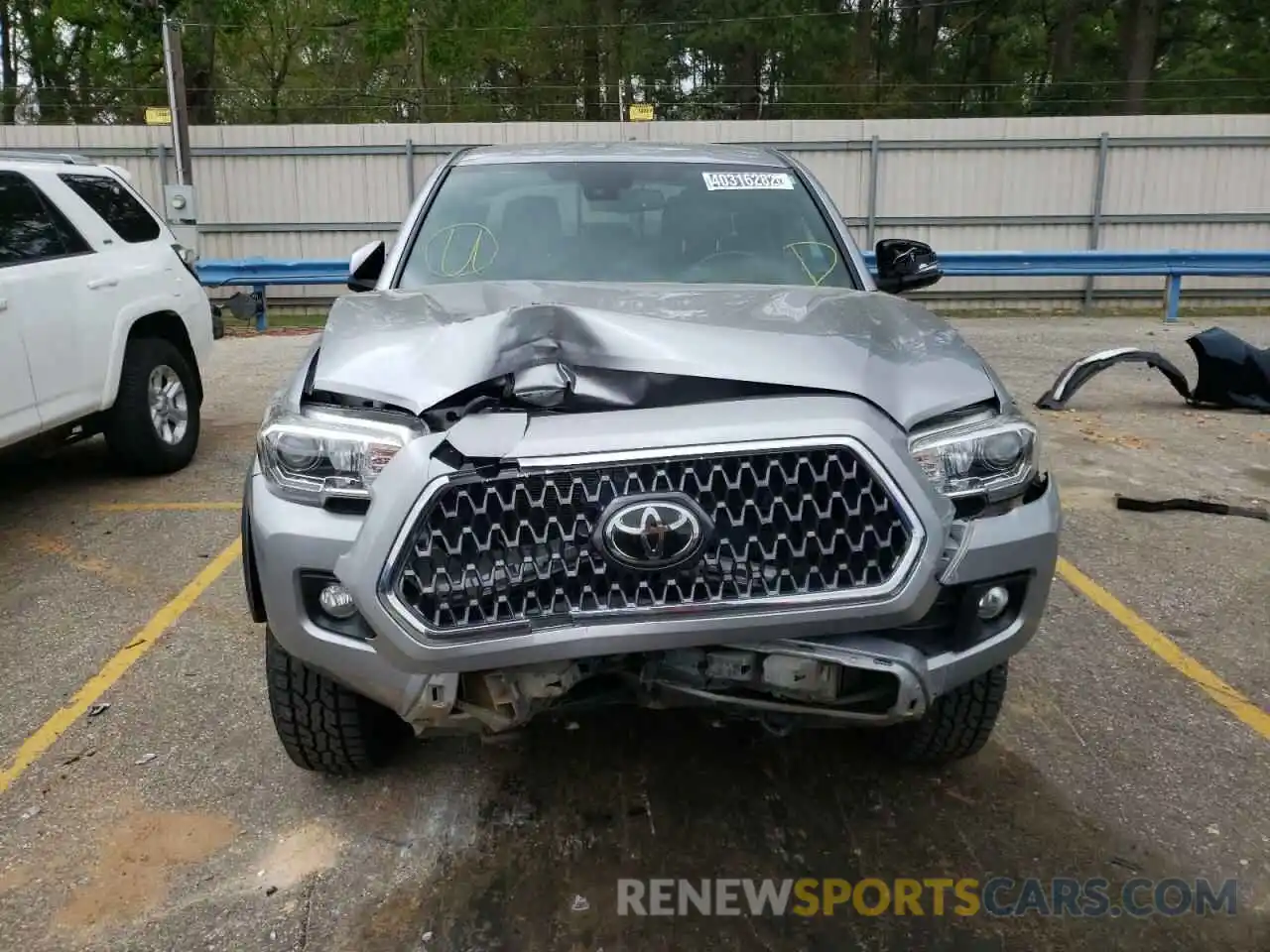 9 Photograph of a damaged car 5TFCZ5AN7KX186303 TOYOTA TACOMA 2019