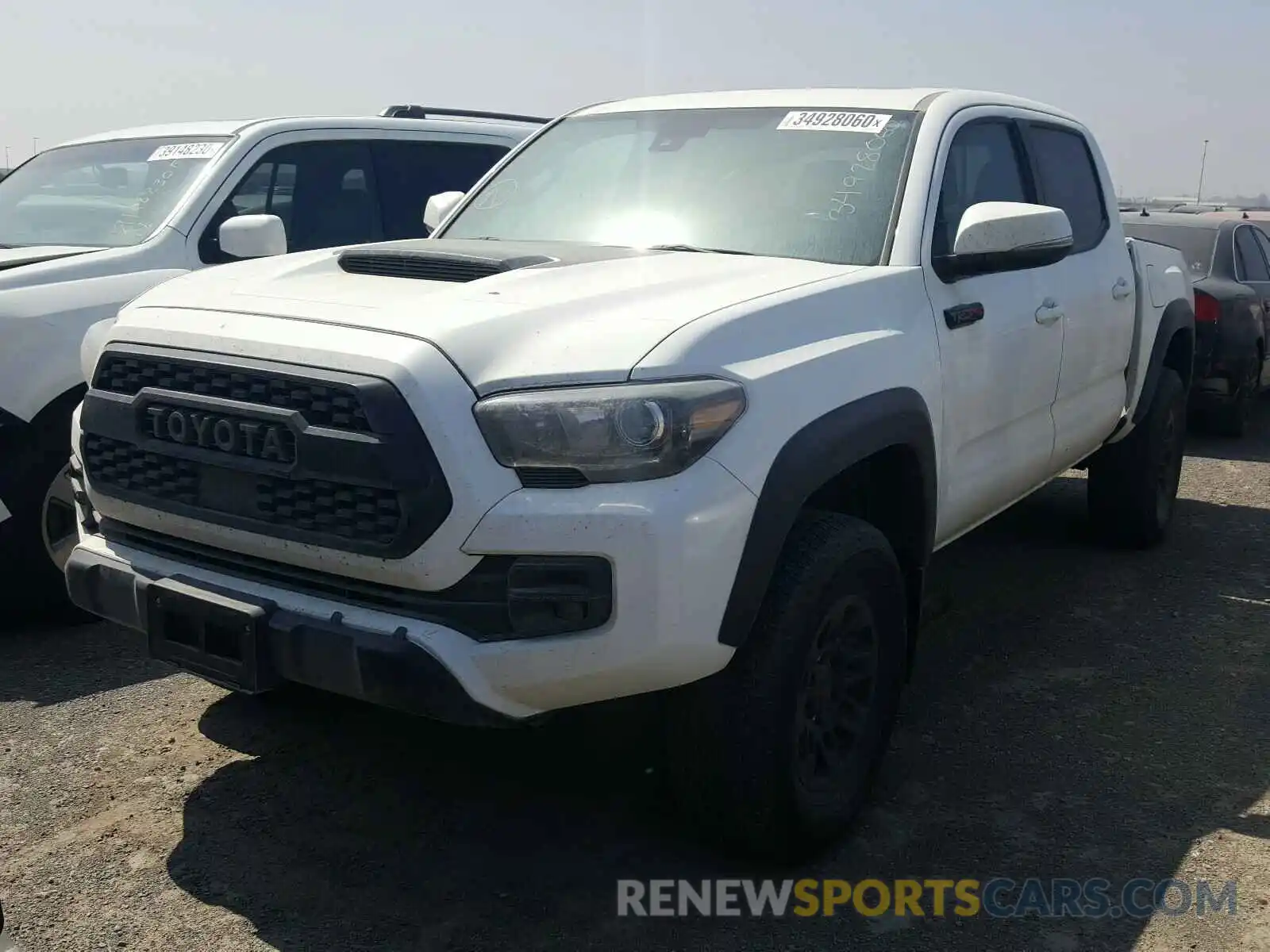 2 Photograph of a damaged car 5TFCZ5AN7KX186642 TOYOTA TACOMA 2019