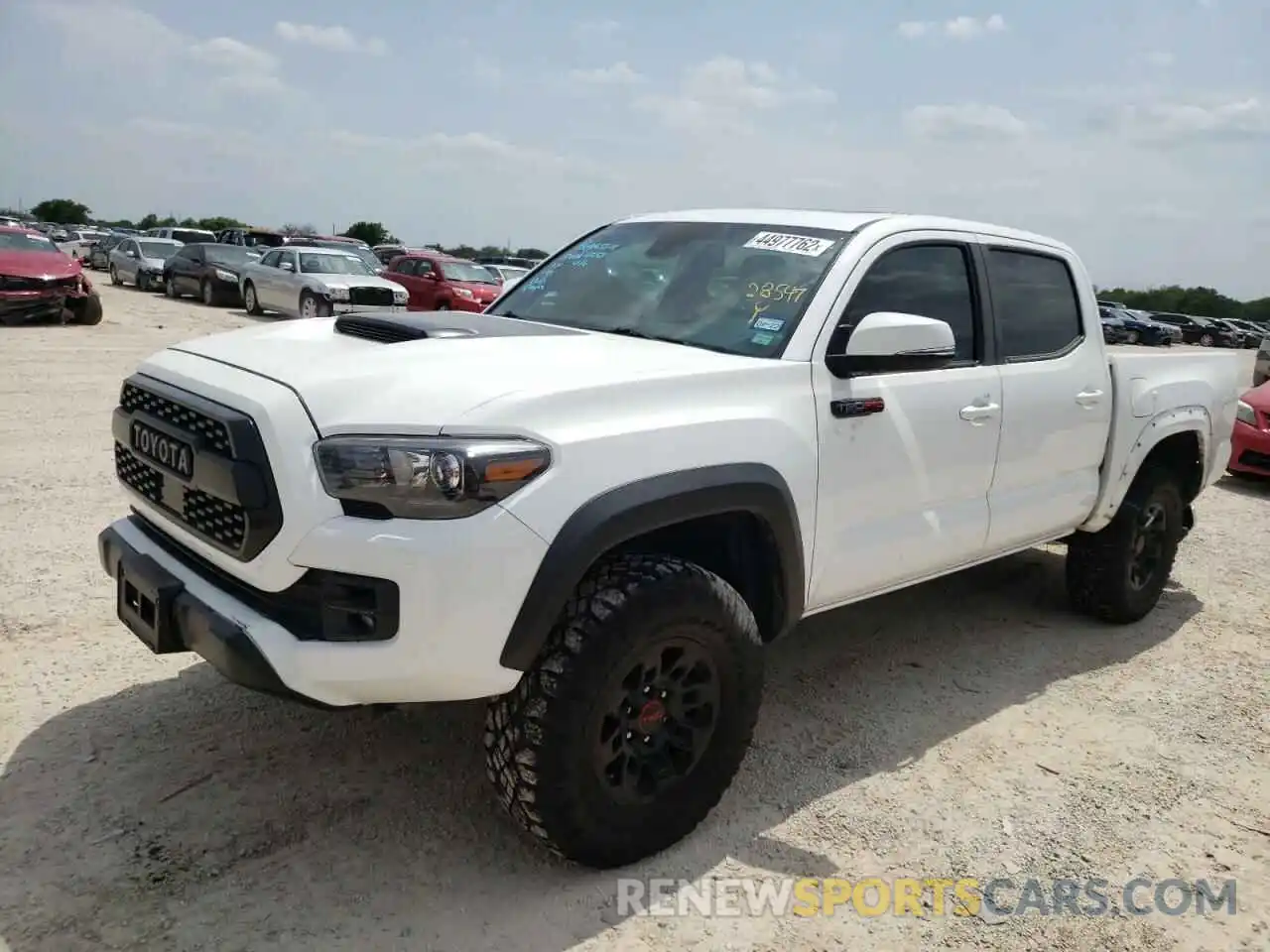 2 Photograph of a damaged car 5TFCZ5AN7KX191727 TOYOTA TACOMA 2019