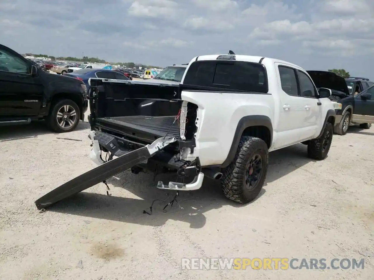 4 Photograph of a damaged car 5TFCZ5AN7KX191727 TOYOTA TACOMA 2019