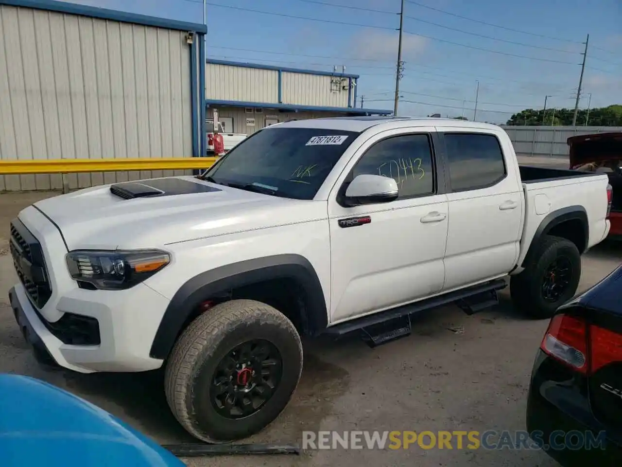 2 Photograph of a damaged car 5TFCZ5AN7KX192327 TOYOTA TACOMA 2019