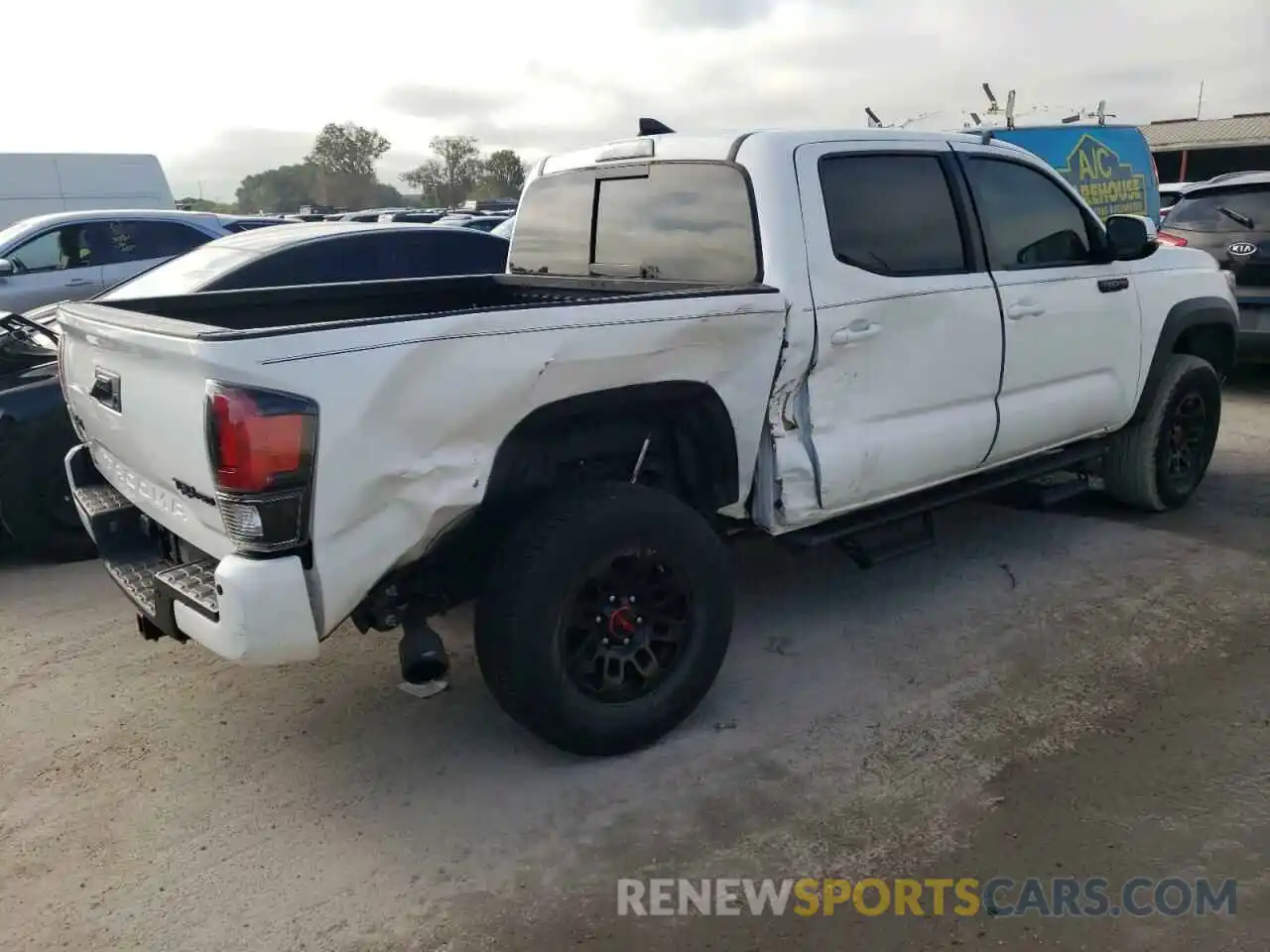 4 Photograph of a damaged car 5TFCZ5AN7KX192327 TOYOTA TACOMA 2019