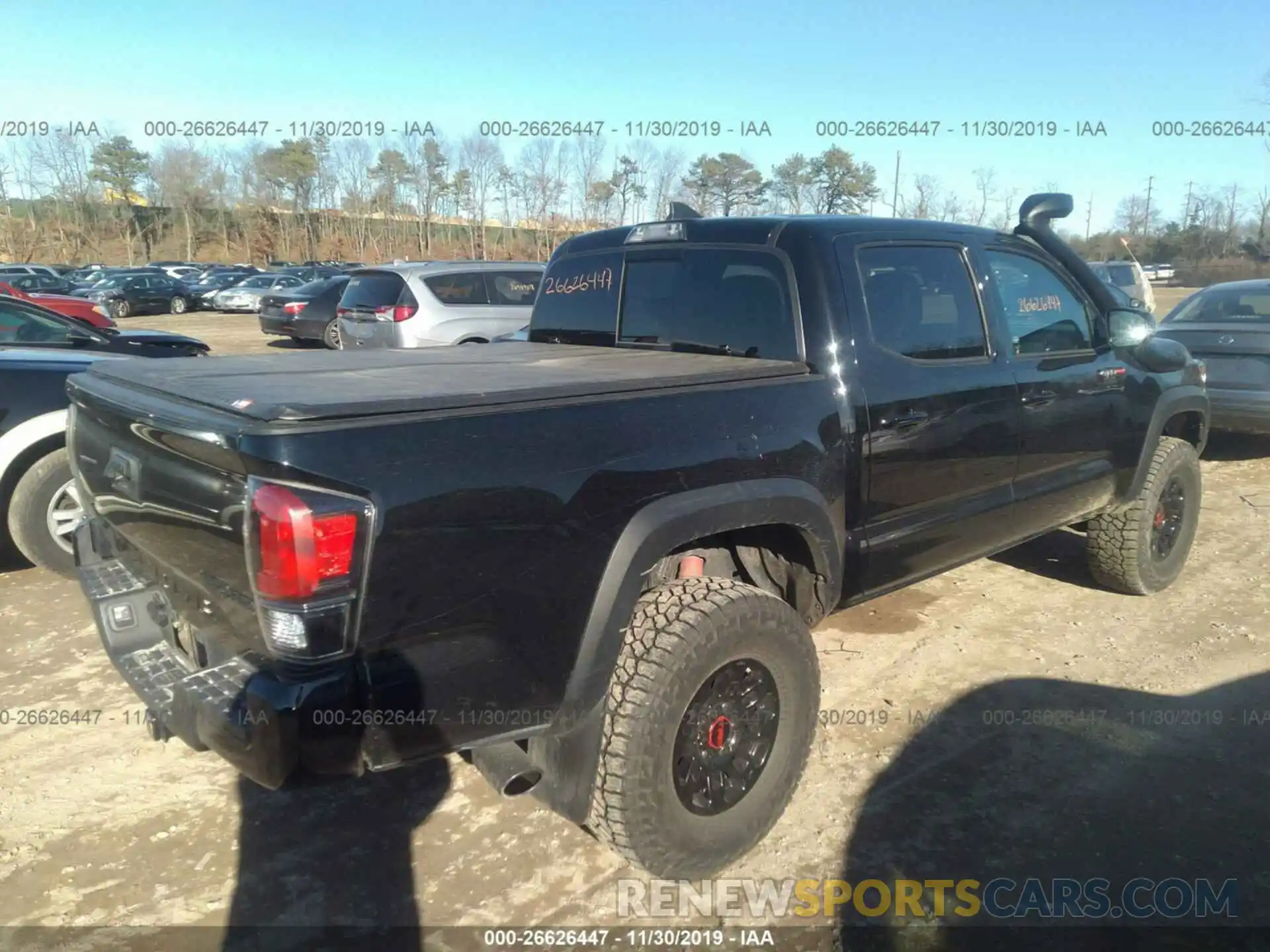 4 Photograph of a damaged car 5TFCZ5AN7KX192683 TOYOTA TACOMA 2019