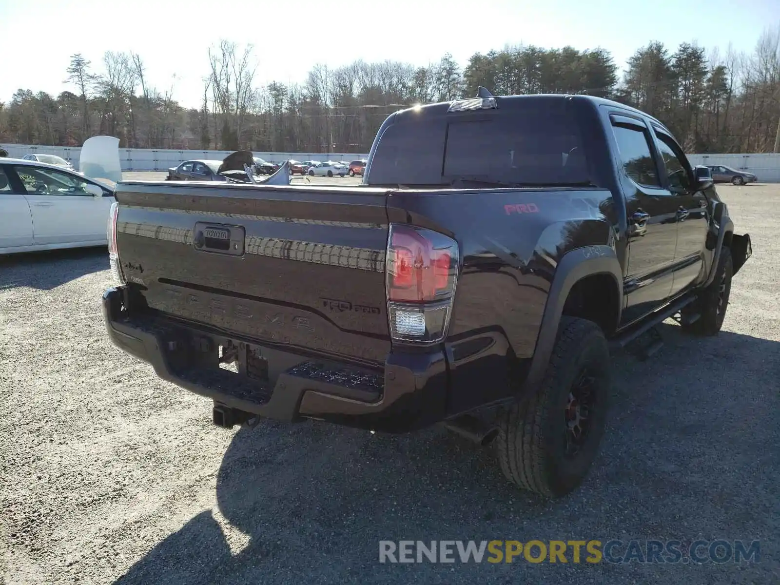 4 Photograph of a damaged car 5TFCZ5AN7KX192814 TOYOTA TACOMA 2019