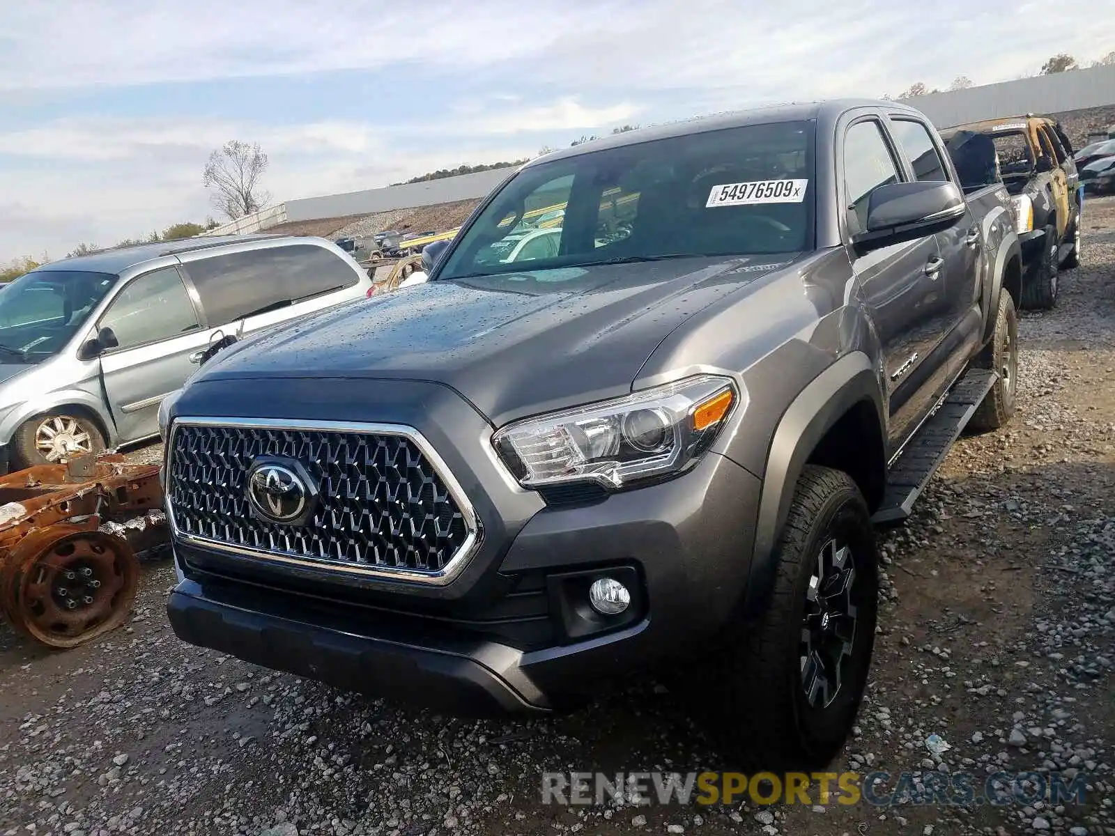 2 Photograph of a damaged car 5TFCZ5AN7KX194742 TOYOTA TACOMA 2019