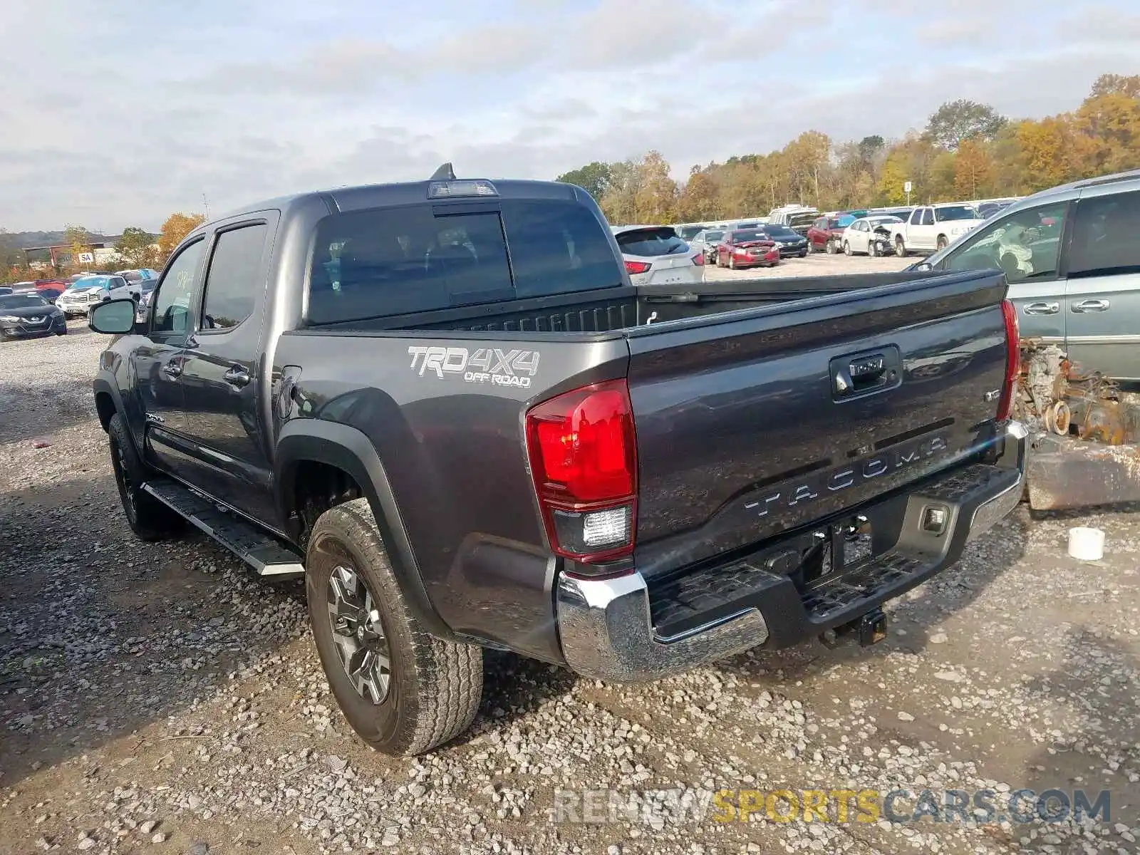 3 Photograph of a damaged car 5TFCZ5AN7KX194742 TOYOTA TACOMA 2019