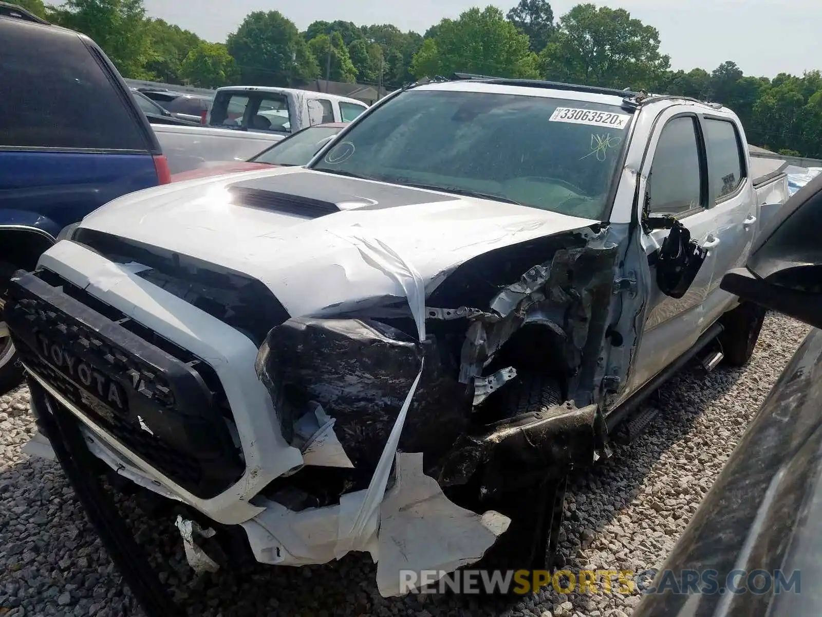 2 Photograph of a damaged car 5TFCZ5AN7KX194997 TOYOTA TACOMA 2019