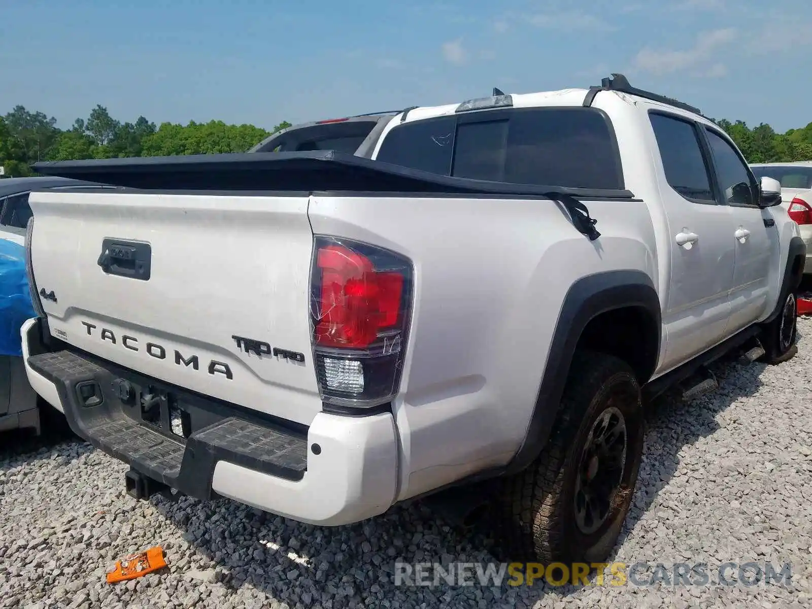 4 Photograph of a damaged car 5TFCZ5AN7KX194997 TOYOTA TACOMA 2019