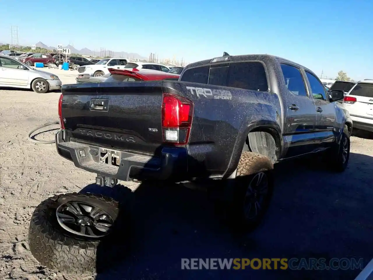 4 Photograph of a damaged car 5TFCZ5AN7KX204735 TOYOTA TACOMA 2019