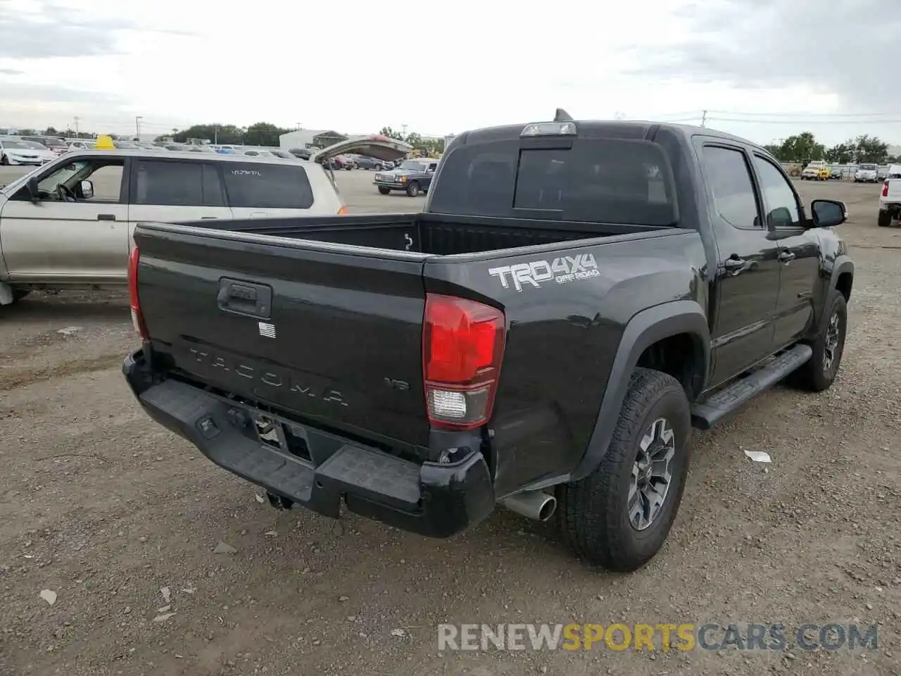 4 Photograph of a damaged car 5TFCZ5AN7KX205528 TOYOTA TACOMA 2019