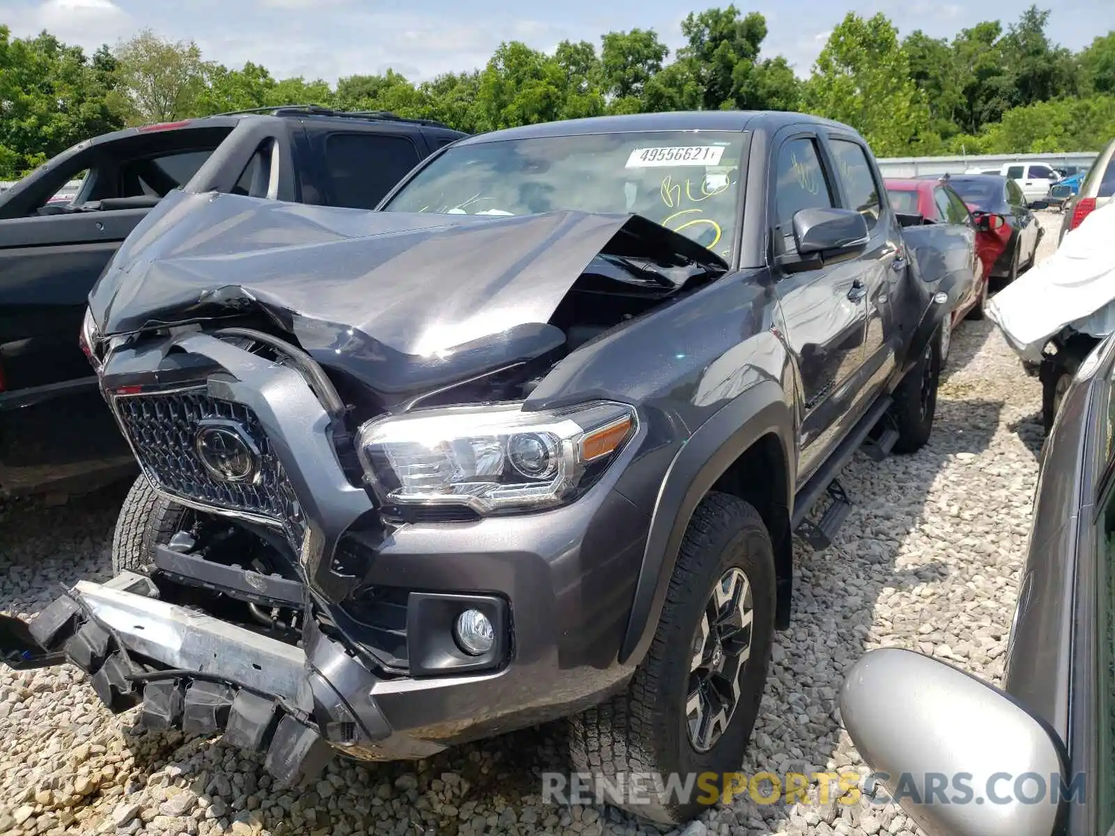 2 Photograph of a damaged car 5TFCZ5AN7KX207764 TOYOTA TACOMA 2019