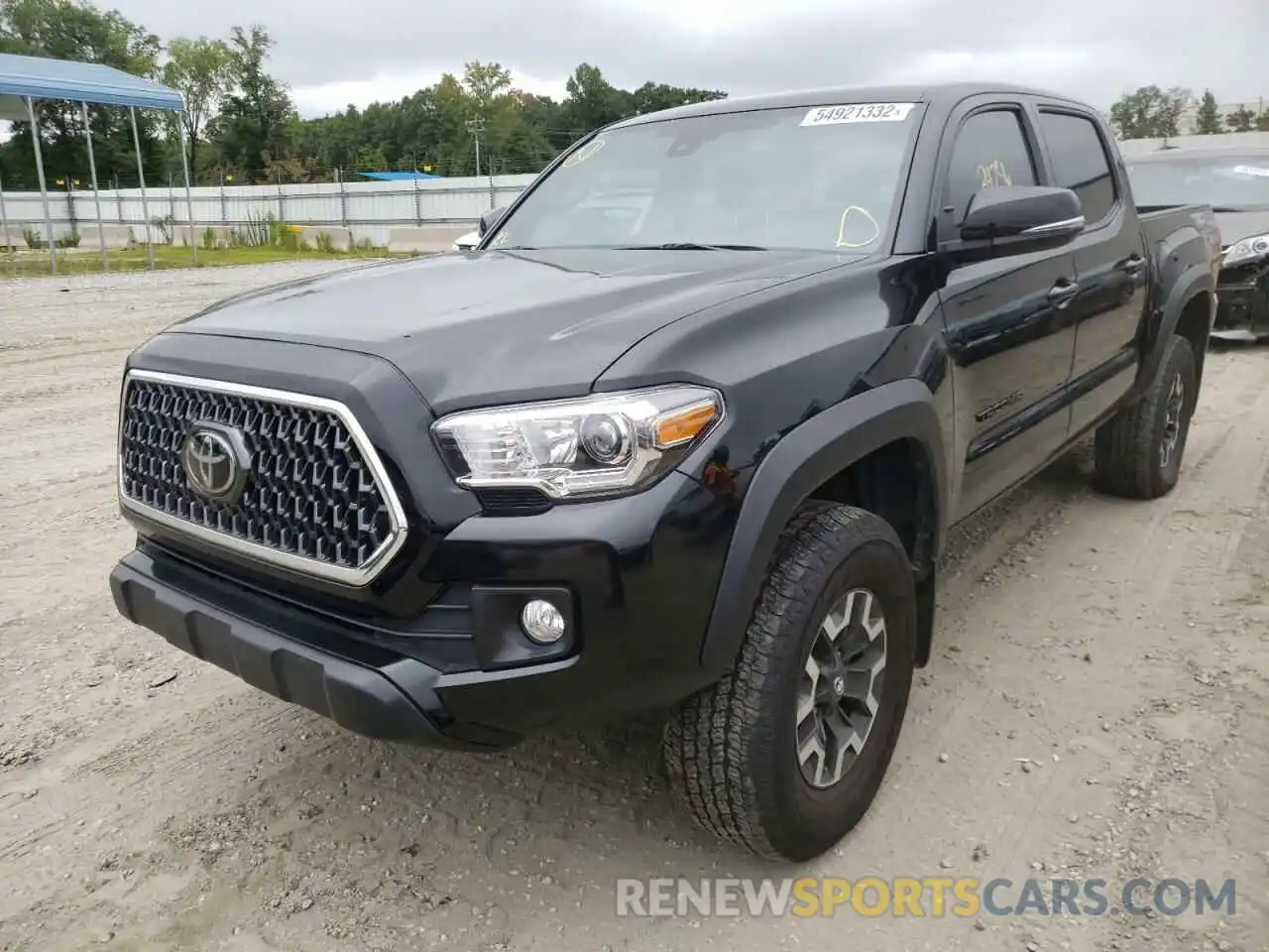 2 Photograph of a damaged car 5TFCZ5AN7KX210499 TOYOTA TACOMA 2019