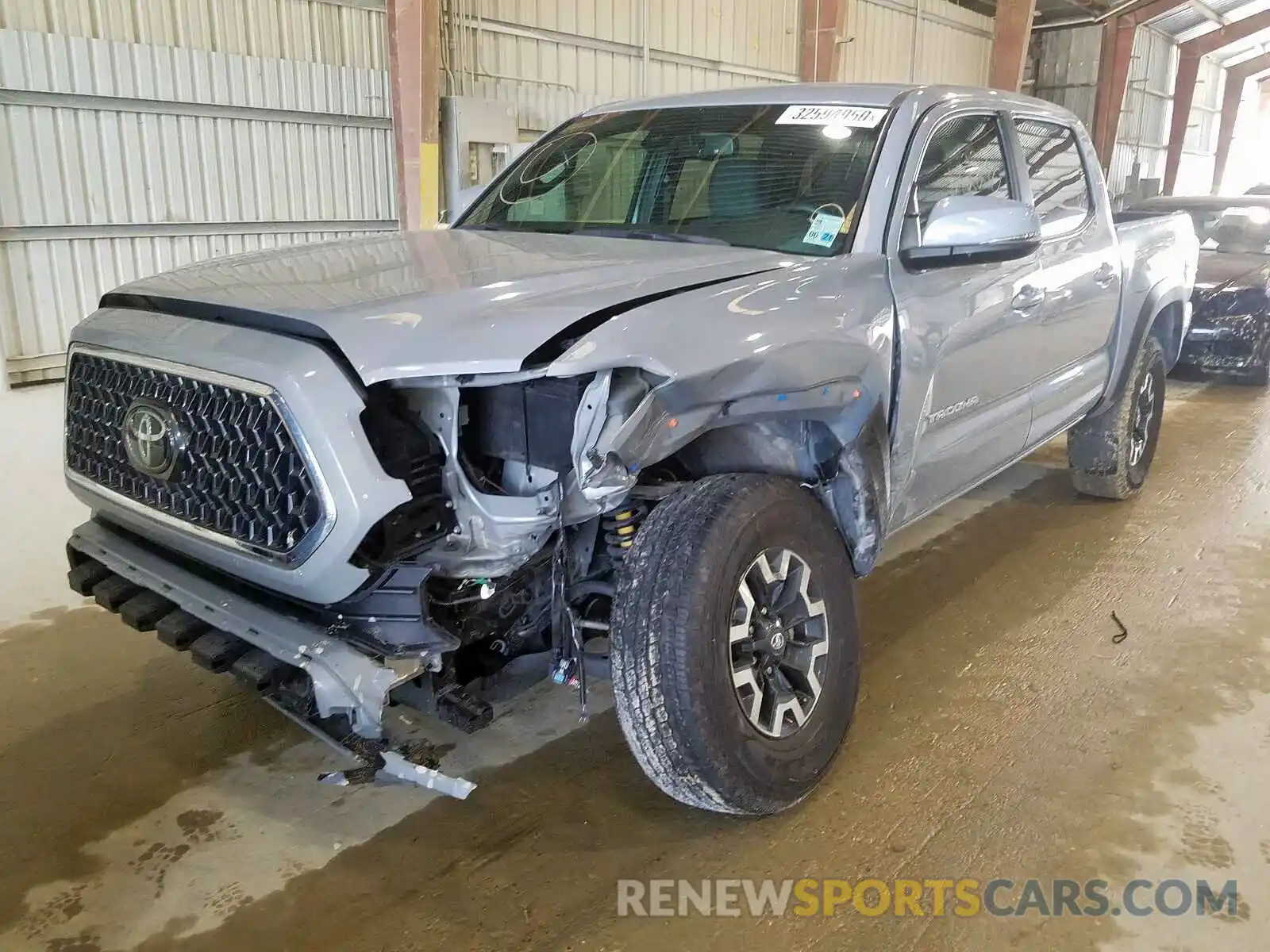 2 Photograph of a damaged car 5TFCZ5AN8KX165556 TOYOTA TACOMA 2019