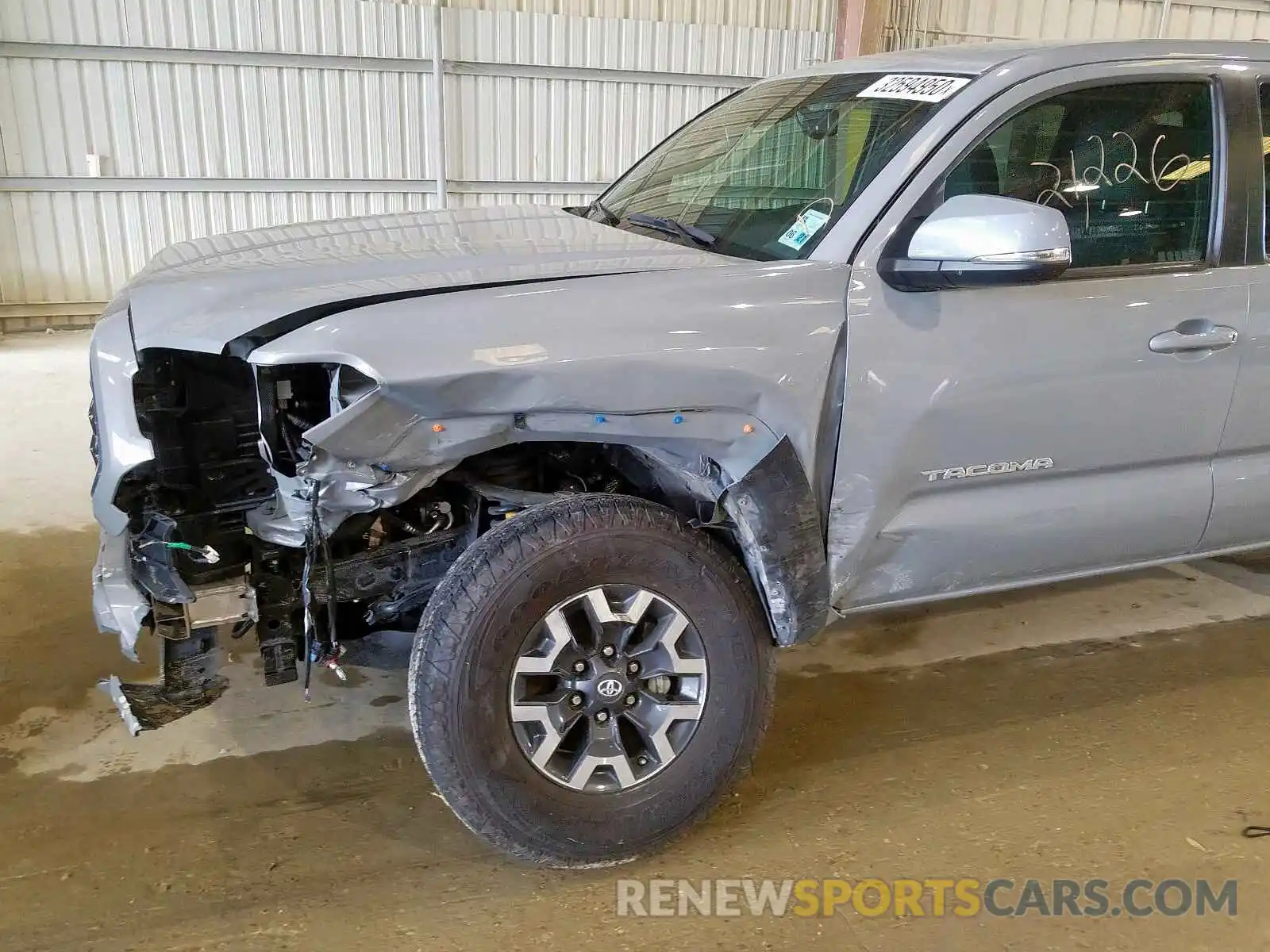 9 Photograph of a damaged car 5TFCZ5AN8KX165556 TOYOTA TACOMA 2019