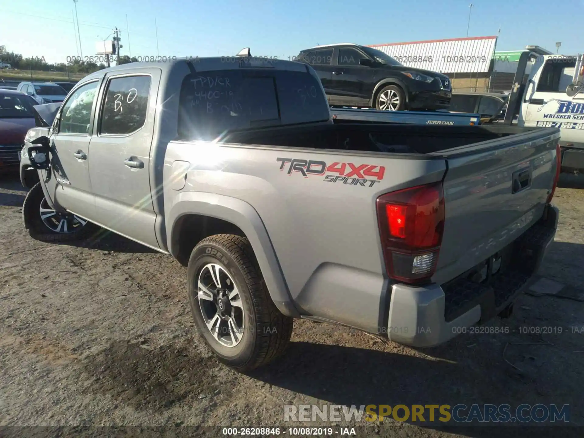 3 Photograph of a damaged car 5TFCZ5AN8KX169560 TOYOTA TACOMA 2019