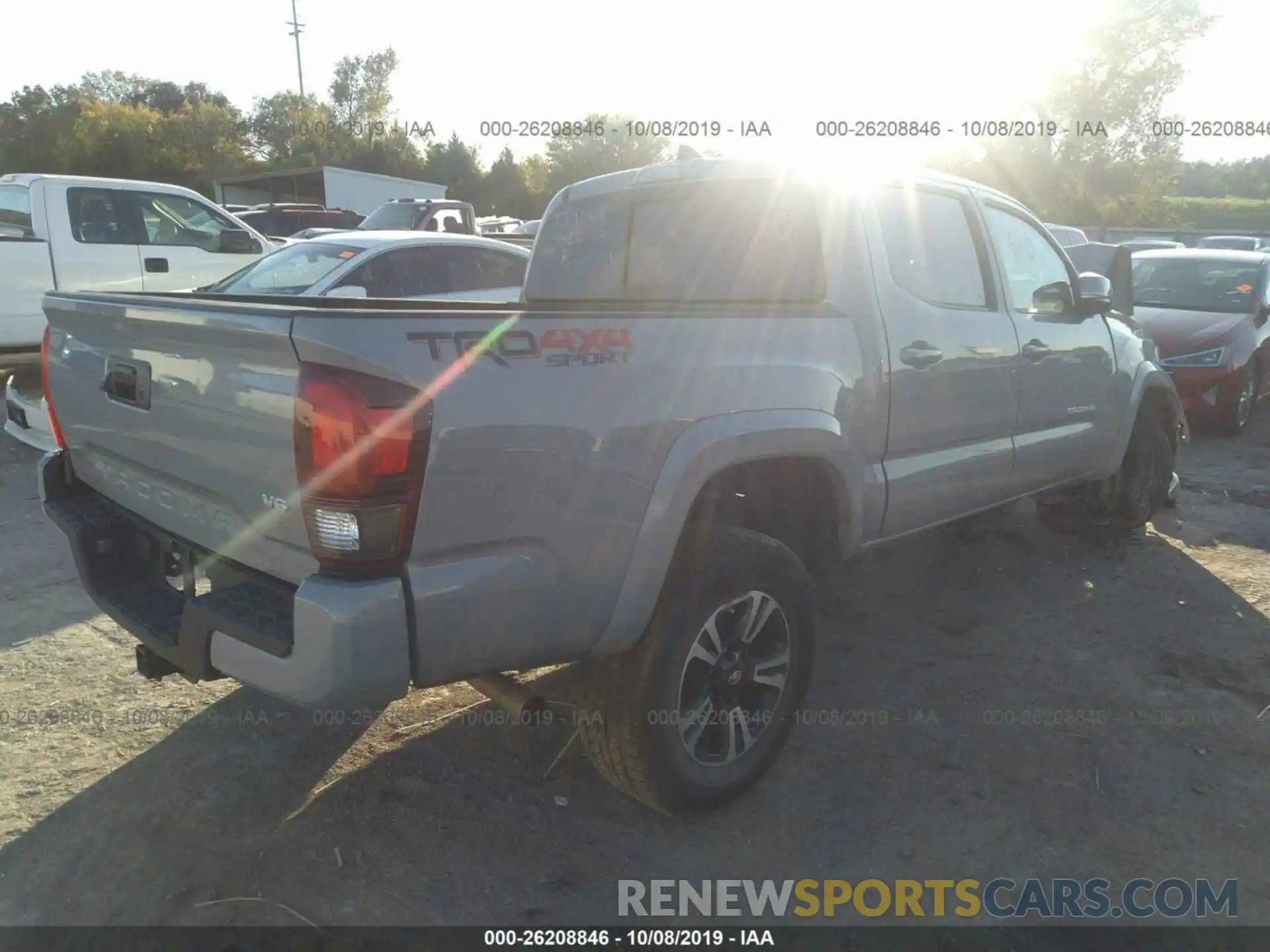 4 Photograph of a damaged car 5TFCZ5AN8KX169560 TOYOTA TACOMA 2019