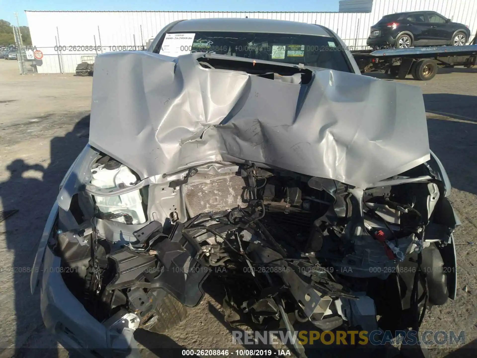 6 Photograph of a damaged car 5TFCZ5AN8KX169560 TOYOTA TACOMA 2019