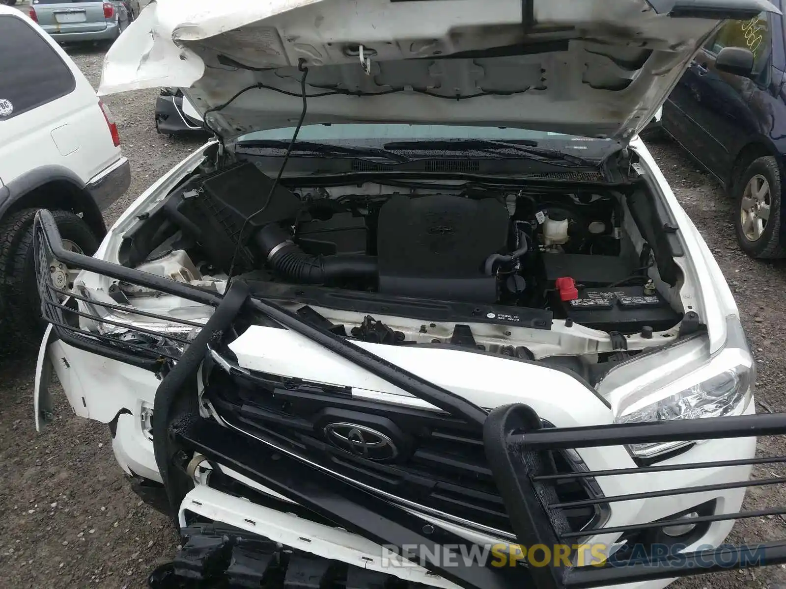 7 Photograph of a damaged car 5TFCZ5AN8KX170191 TOYOTA TACOMA 2019