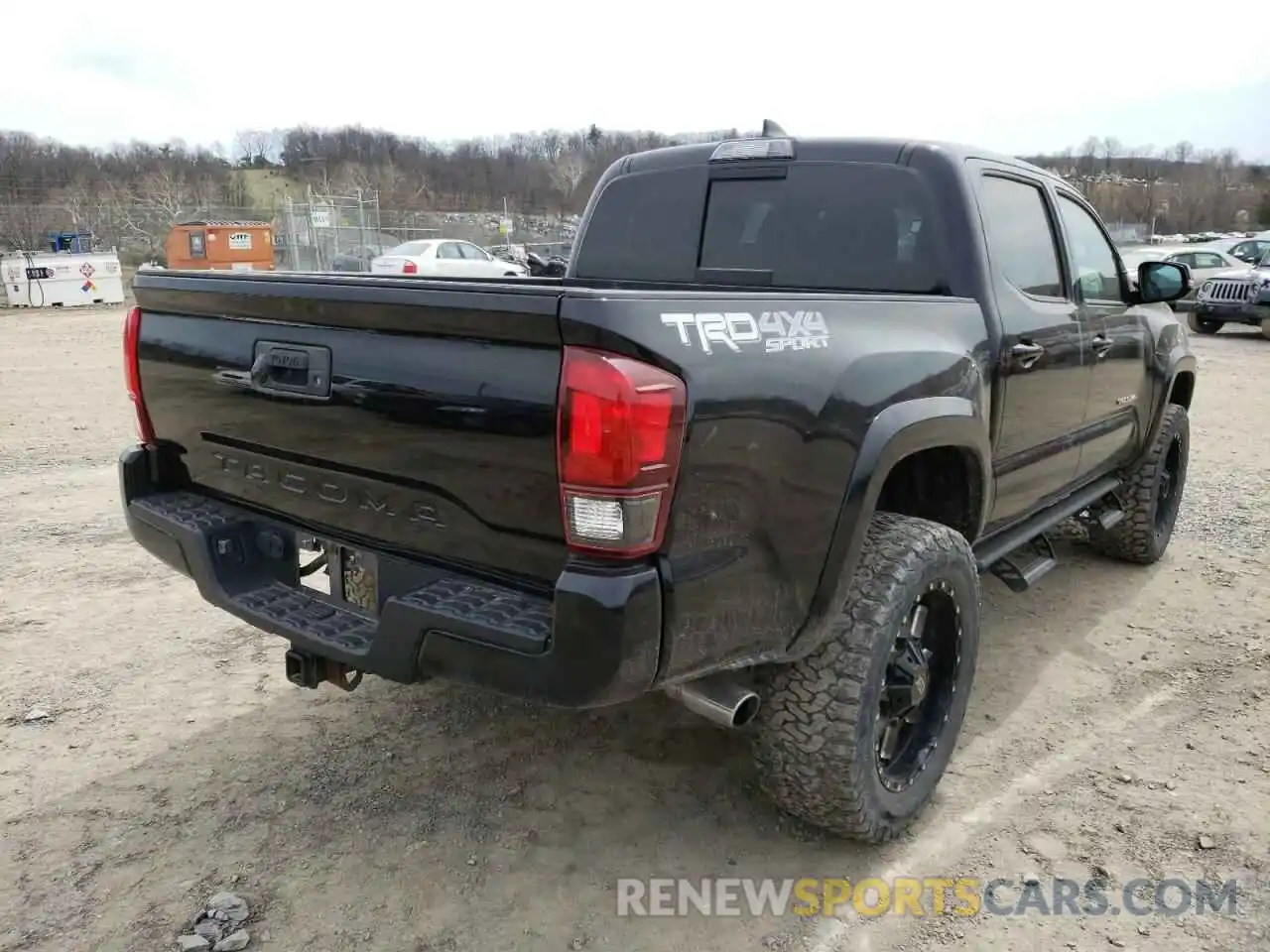 4 Photograph of a damaged car 5TFCZ5AN8KX170630 TOYOTA TACOMA 2019