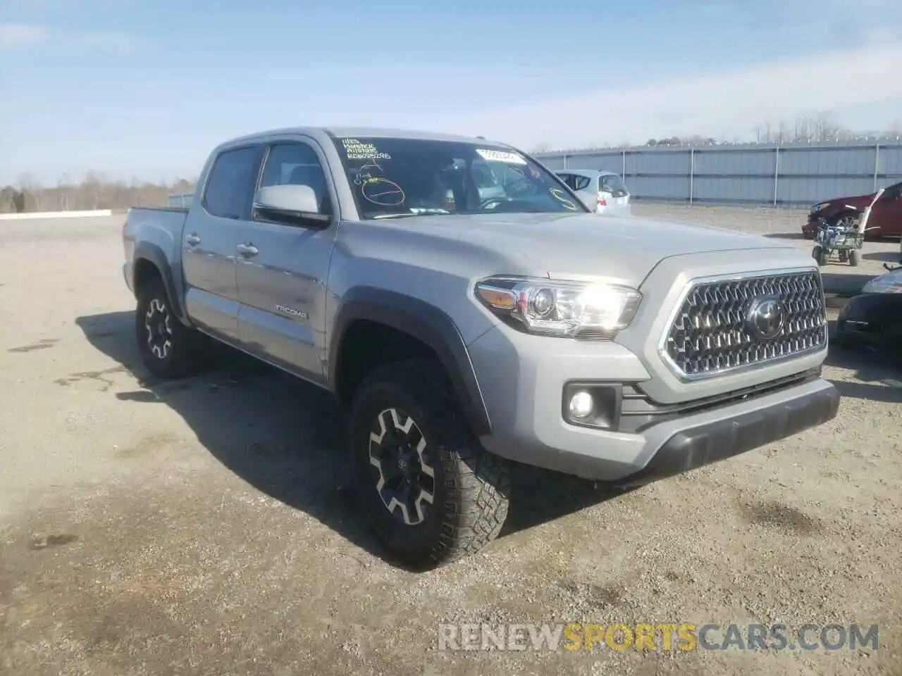 1 Photograph of a damaged car 5TFCZ5AN8KX179912 TOYOTA TACOMA 2019