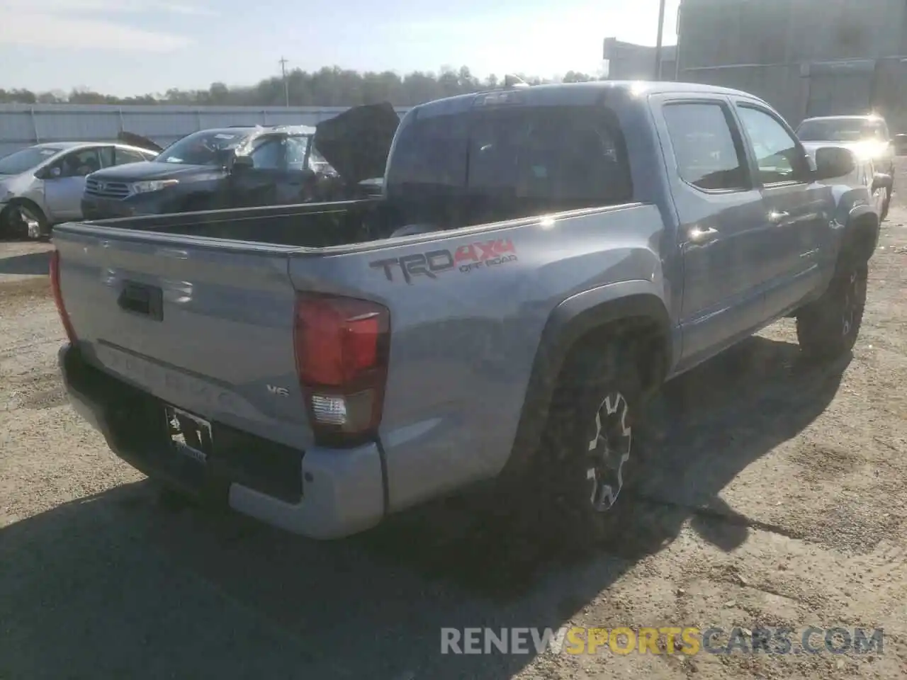 4 Photograph of a damaged car 5TFCZ5AN8KX179912 TOYOTA TACOMA 2019