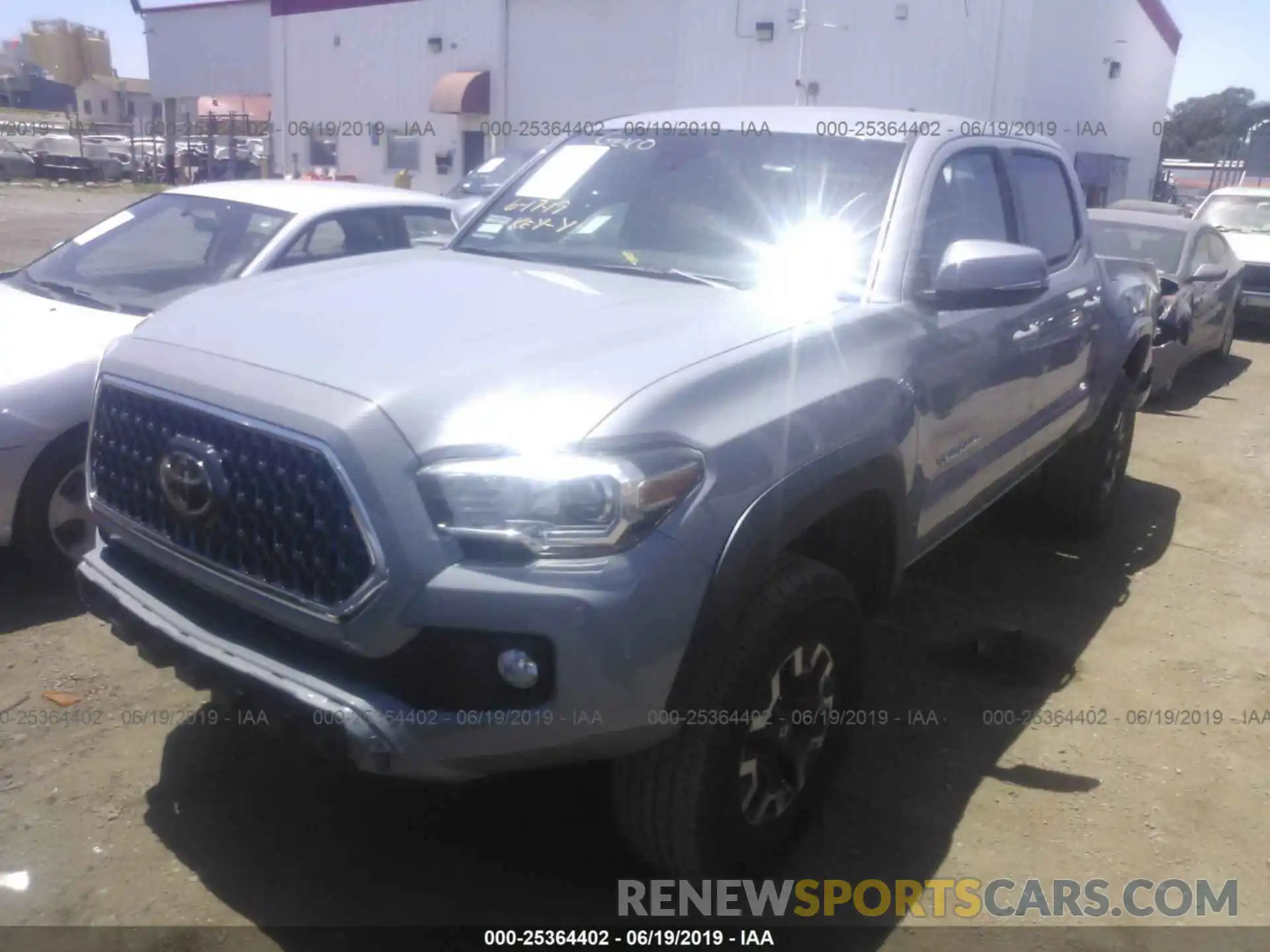 2 Photograph of a damaged car 5TFCZ5AN8KX183121 TOYOTA TACOMA 2019