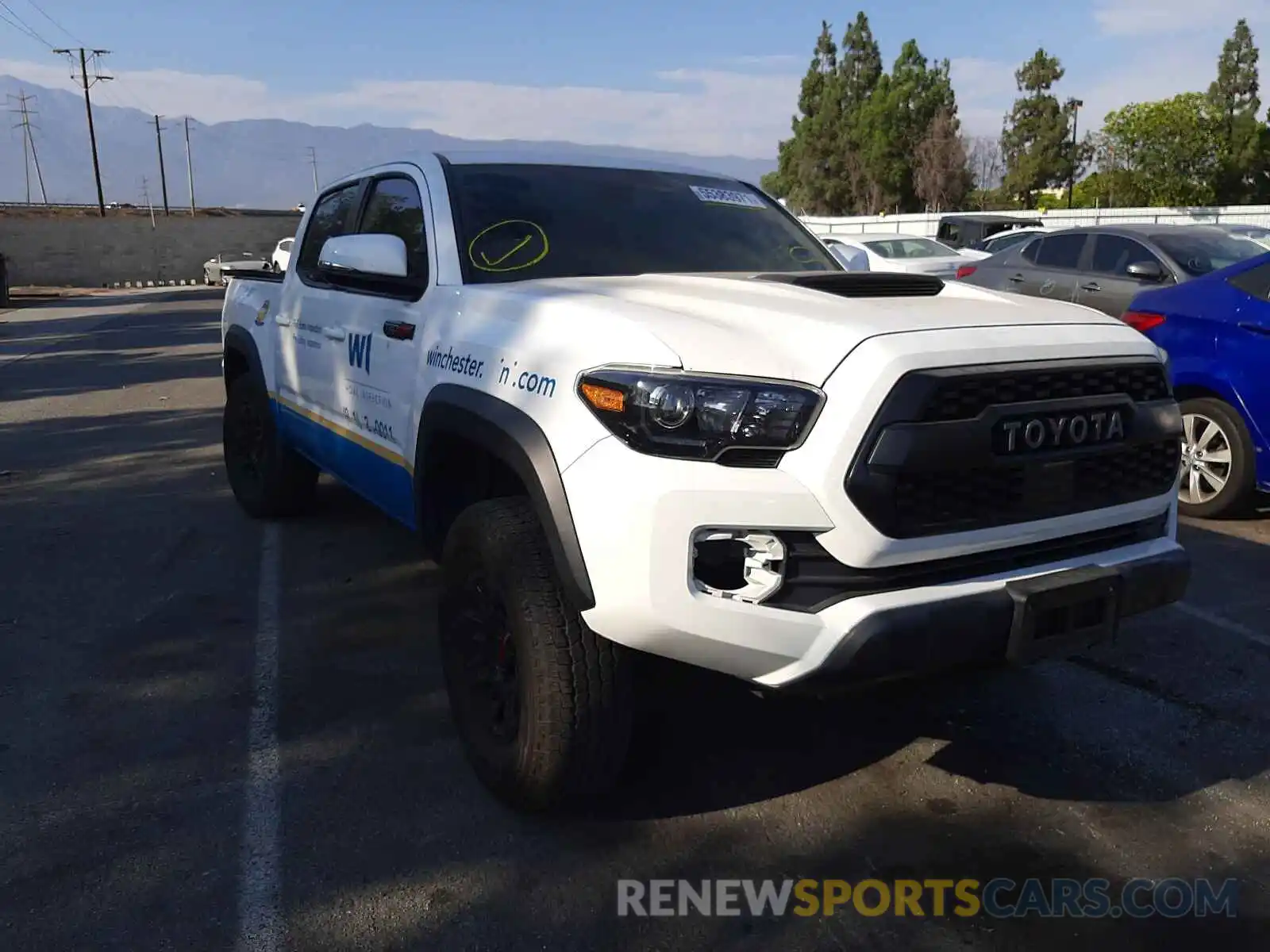 1 Photograph of a damaged car 5TFCZ5AN8KX183958 TOYOTA TACOMA 2019