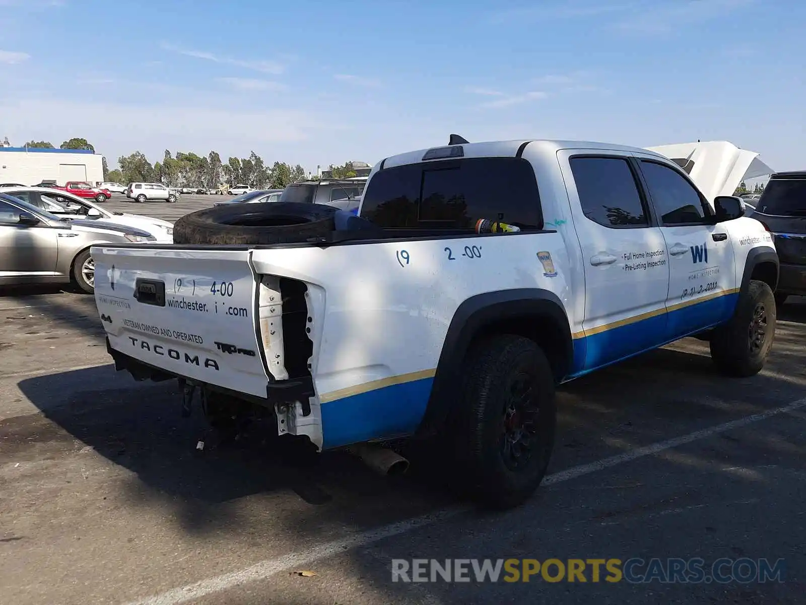 4 Photograph of a damaged car 5TFCZ5AN8KX183958 TOYOTA TACOMA 2019