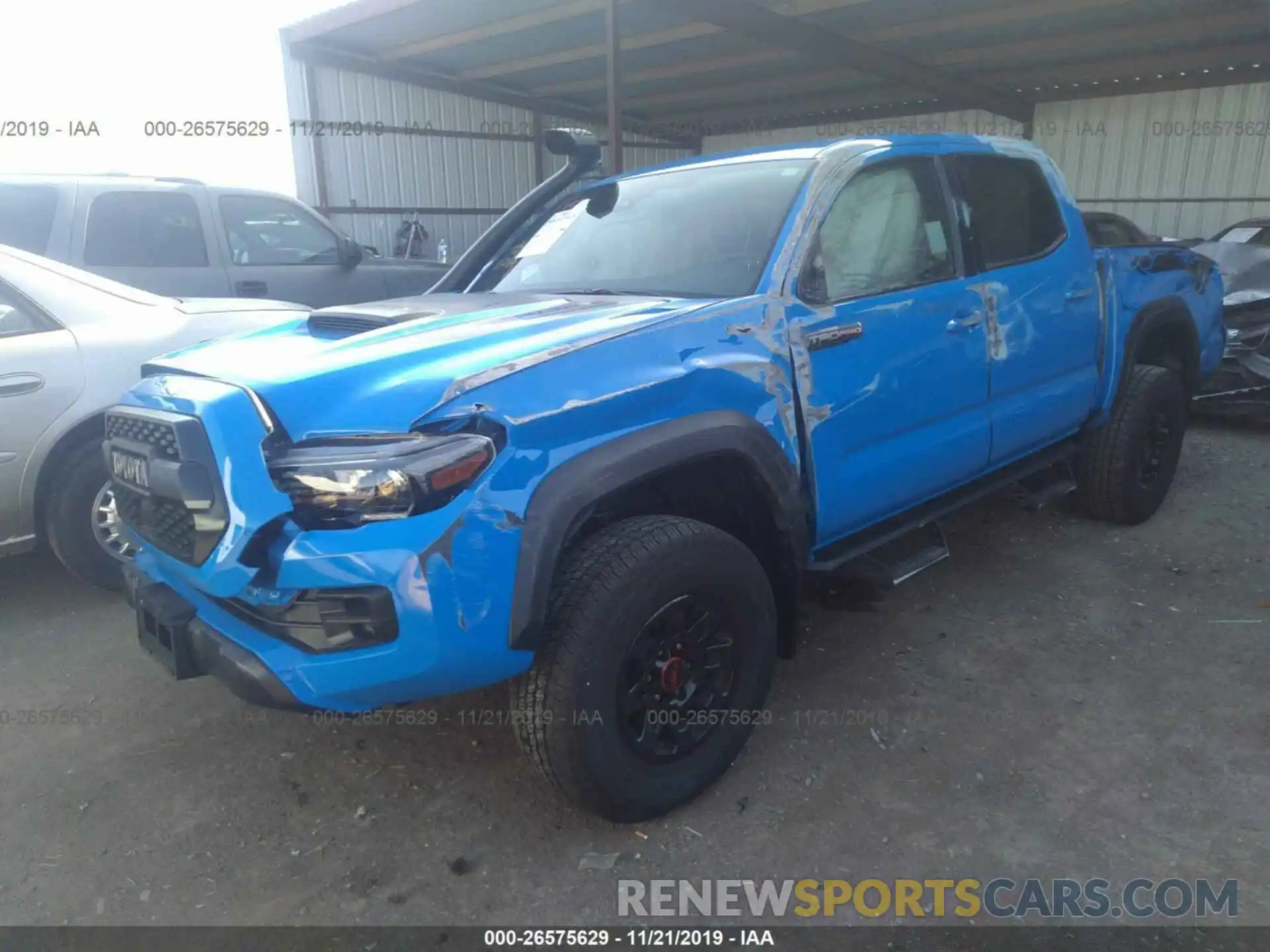 2 Photograph of a damaged car 5TFCZ5AN8KX186374 TOYOTA TACOMA 2019