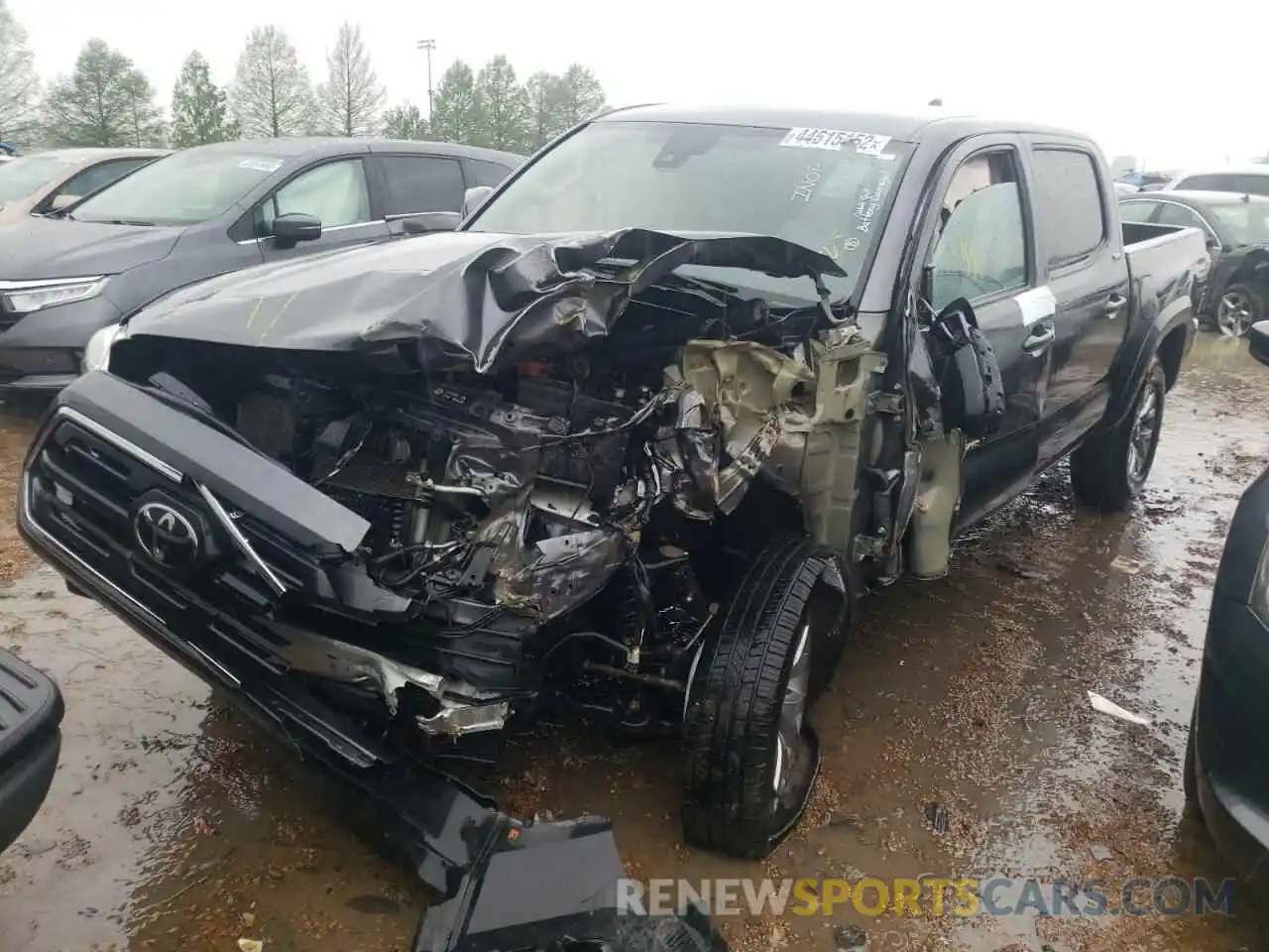 2 Photograph of a damaged car 5TFCZ5AN8KX186441 TOYOTA TACOMA 2019