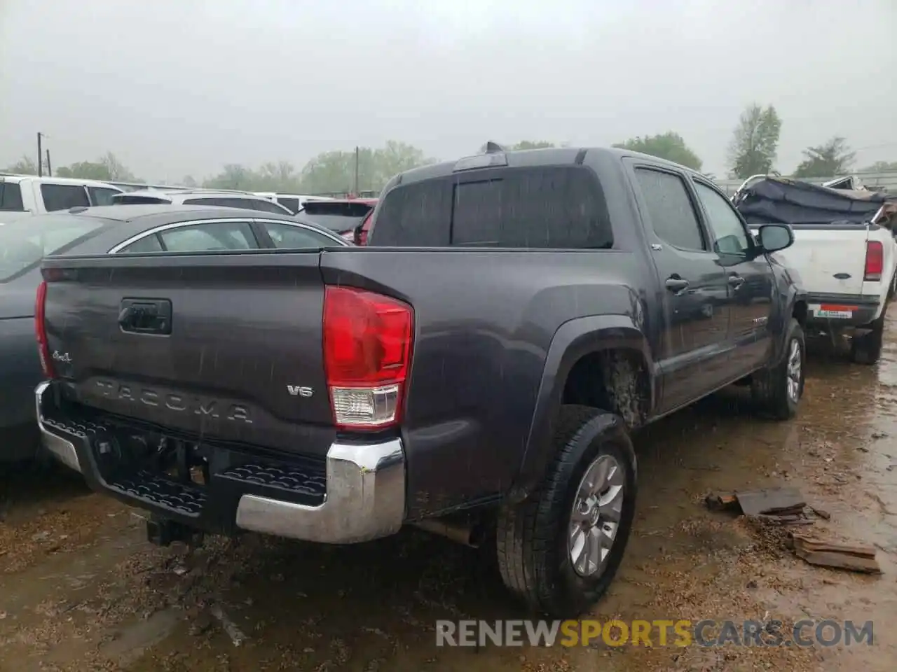 4 Photograph of a damaged car 5TFCZ5AN8KX186441 TOYOTA TACOMA 2019