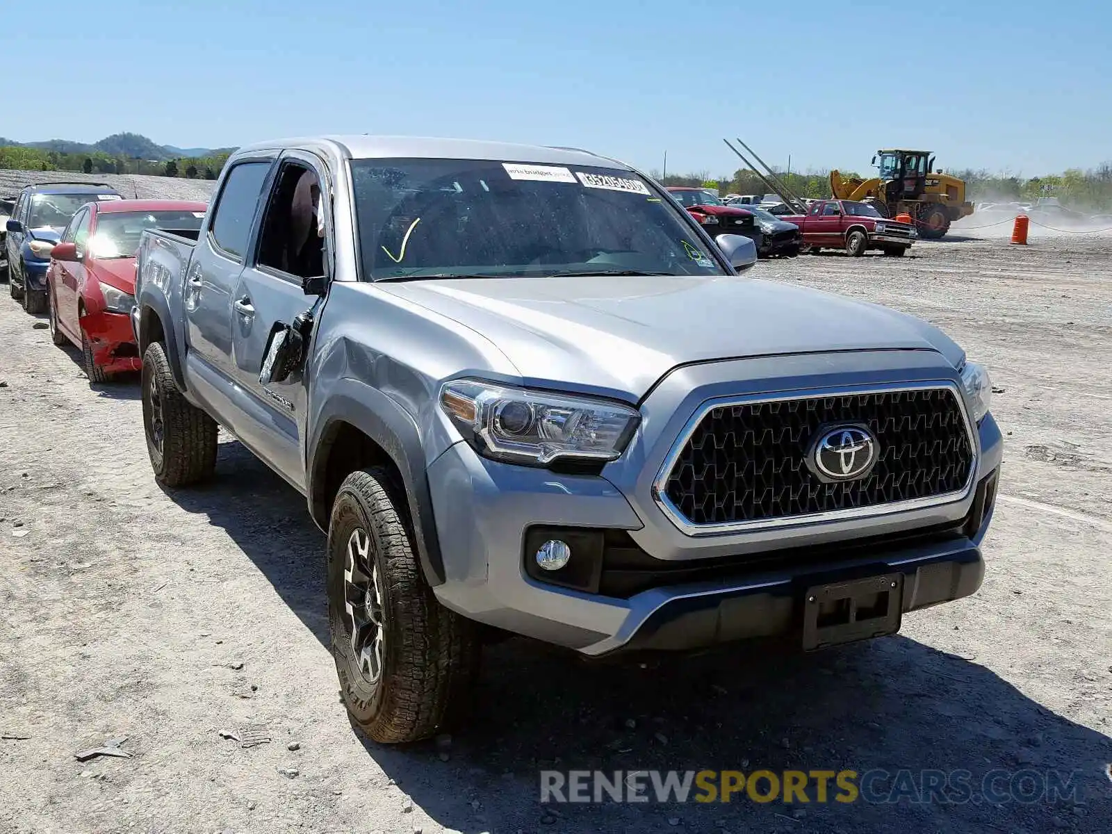 1 Photograph of a damaged car 5TFCZ5AN8KX186679 TOYOTA TACOMA 2019