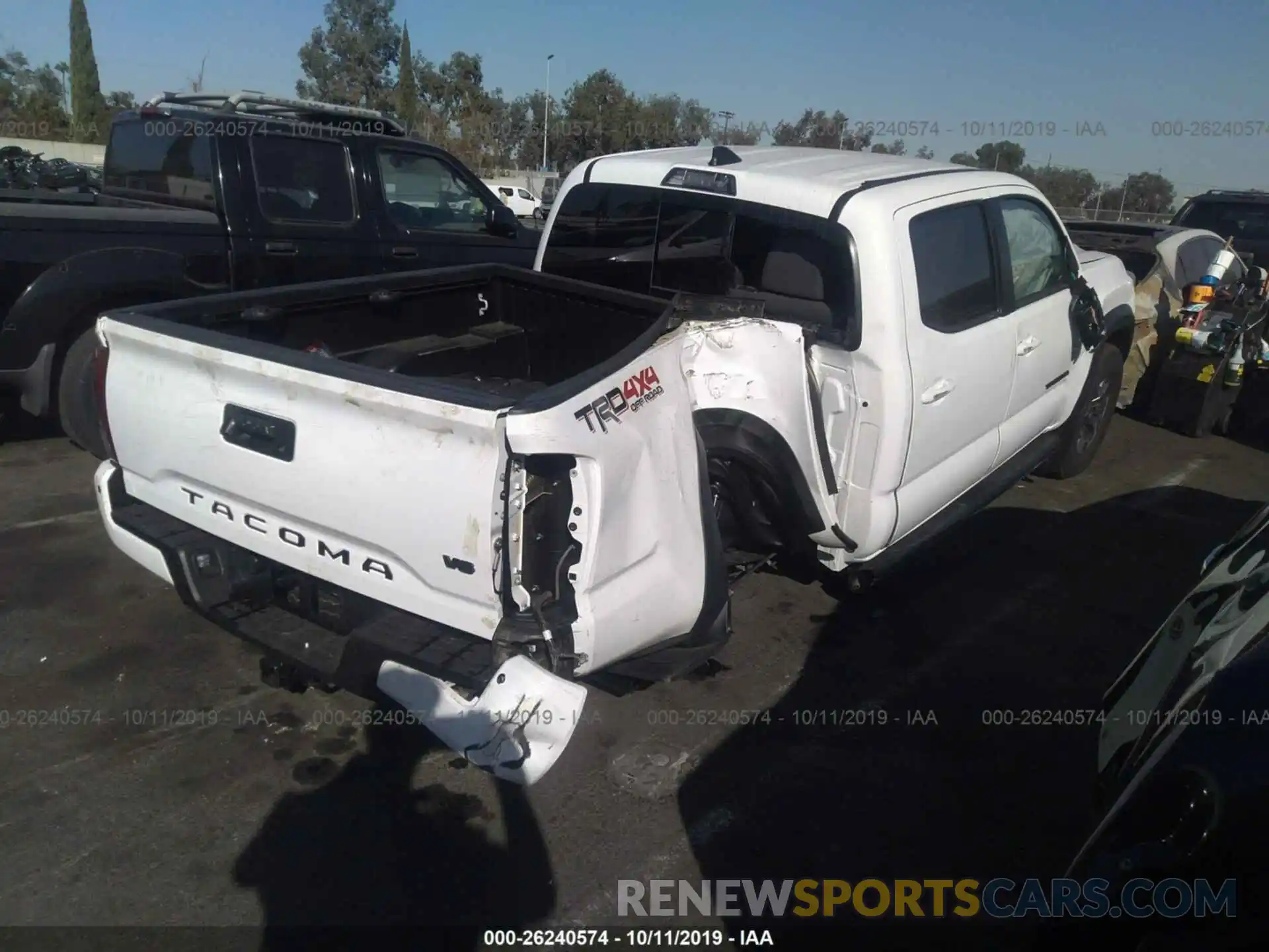 4 Photograph of a damaged car 5TFCZ5AN8KX188755 TOYOTA TACOMA 2019