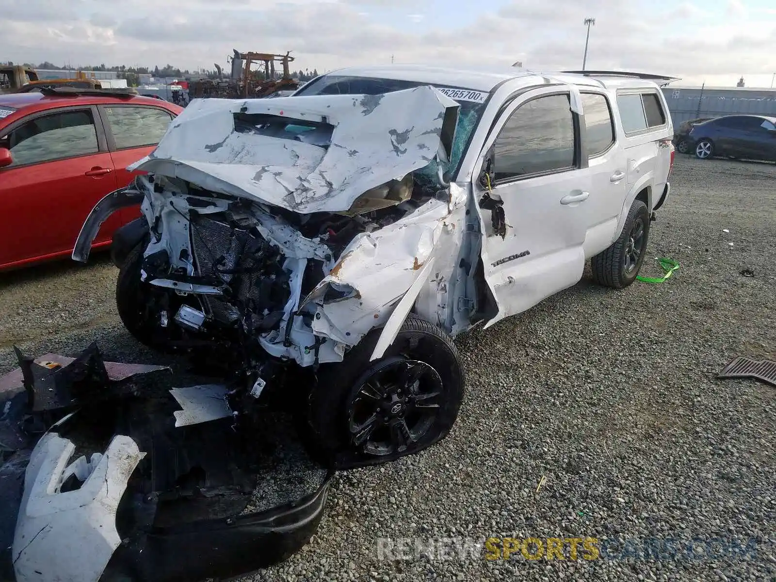 2 Photograph of a damaged car 5TFCZ5AN8KX189467 TOYOTA TACOMA 2019