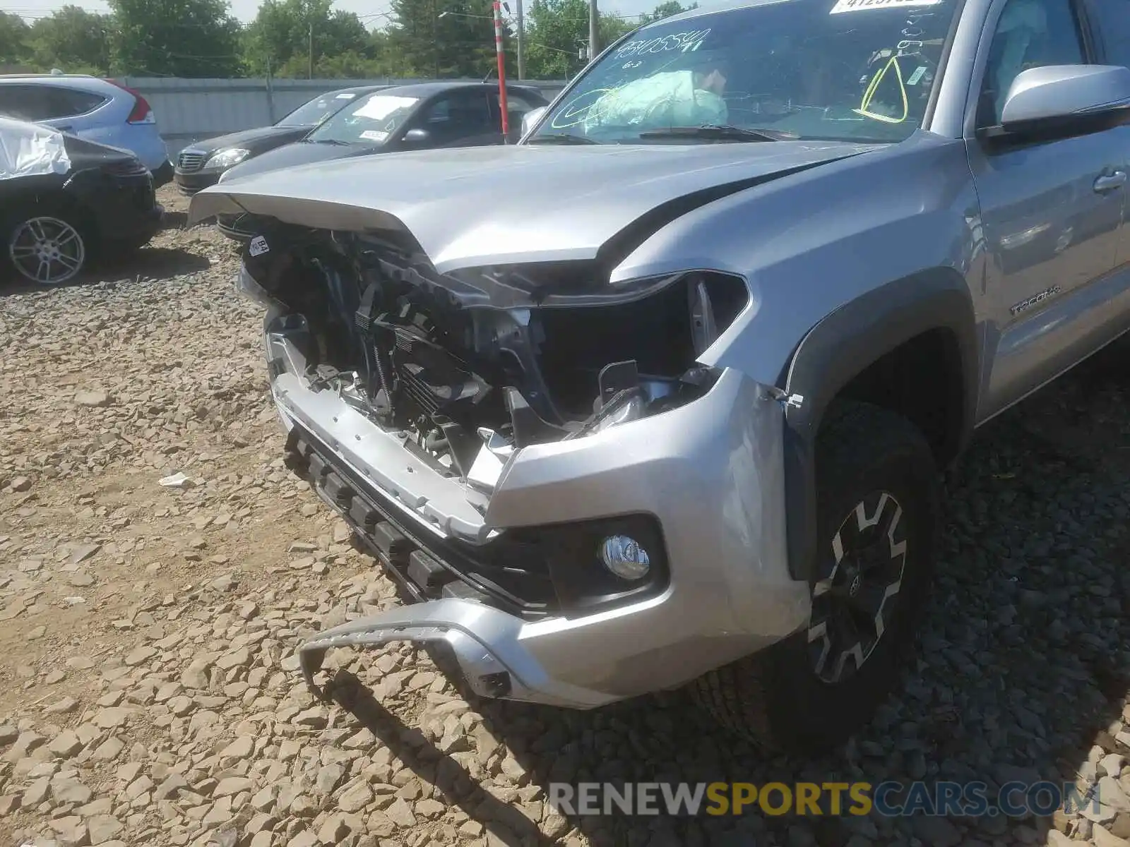 9 Photograph of a damaged car 5TFCZ5AN8KX190442 TOYOTA TACOMA 2019