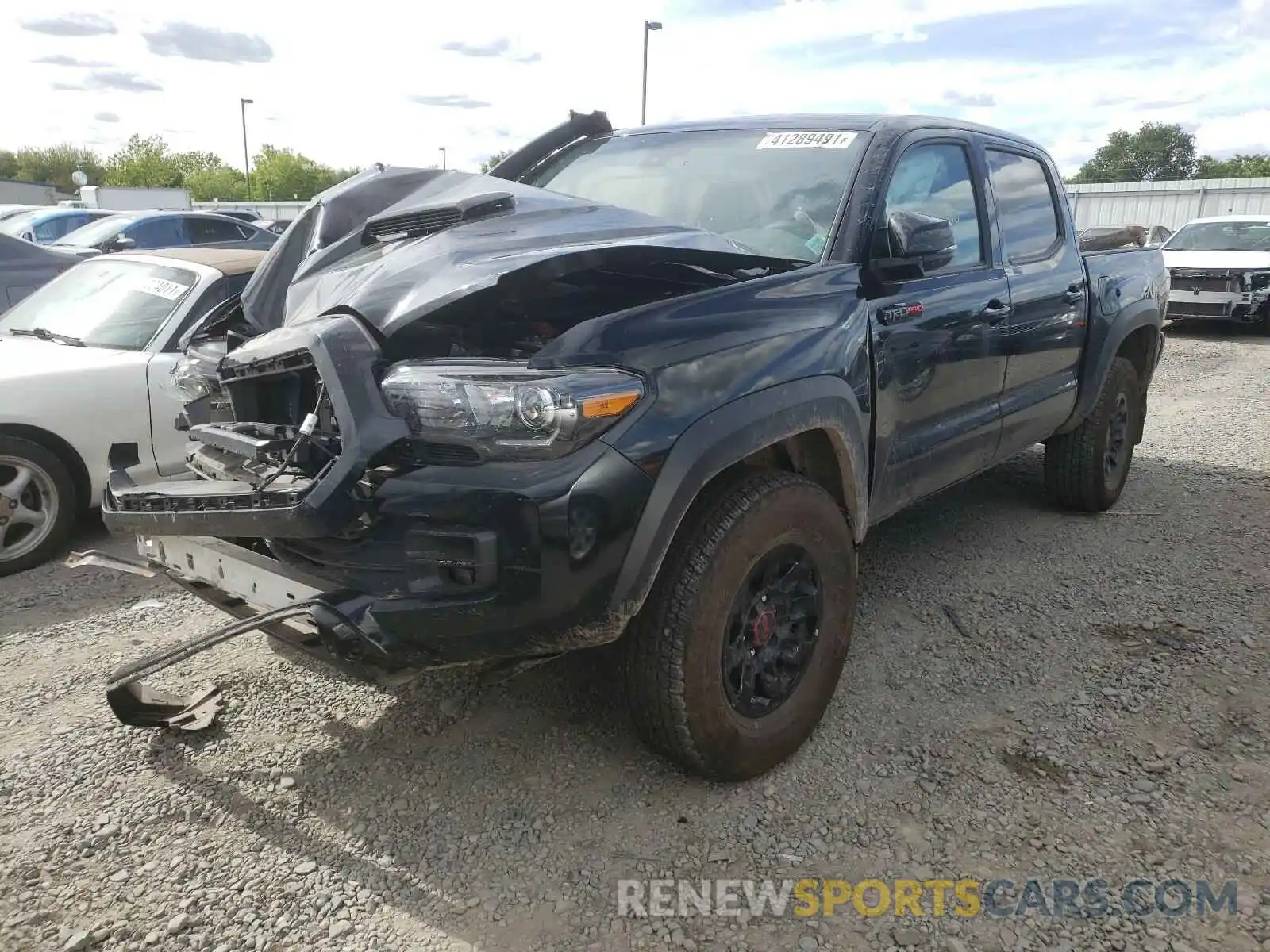 2 Photograph of a damaged car 5TFCZ5AN8KX190604 TOYOTA TACOMA 2019