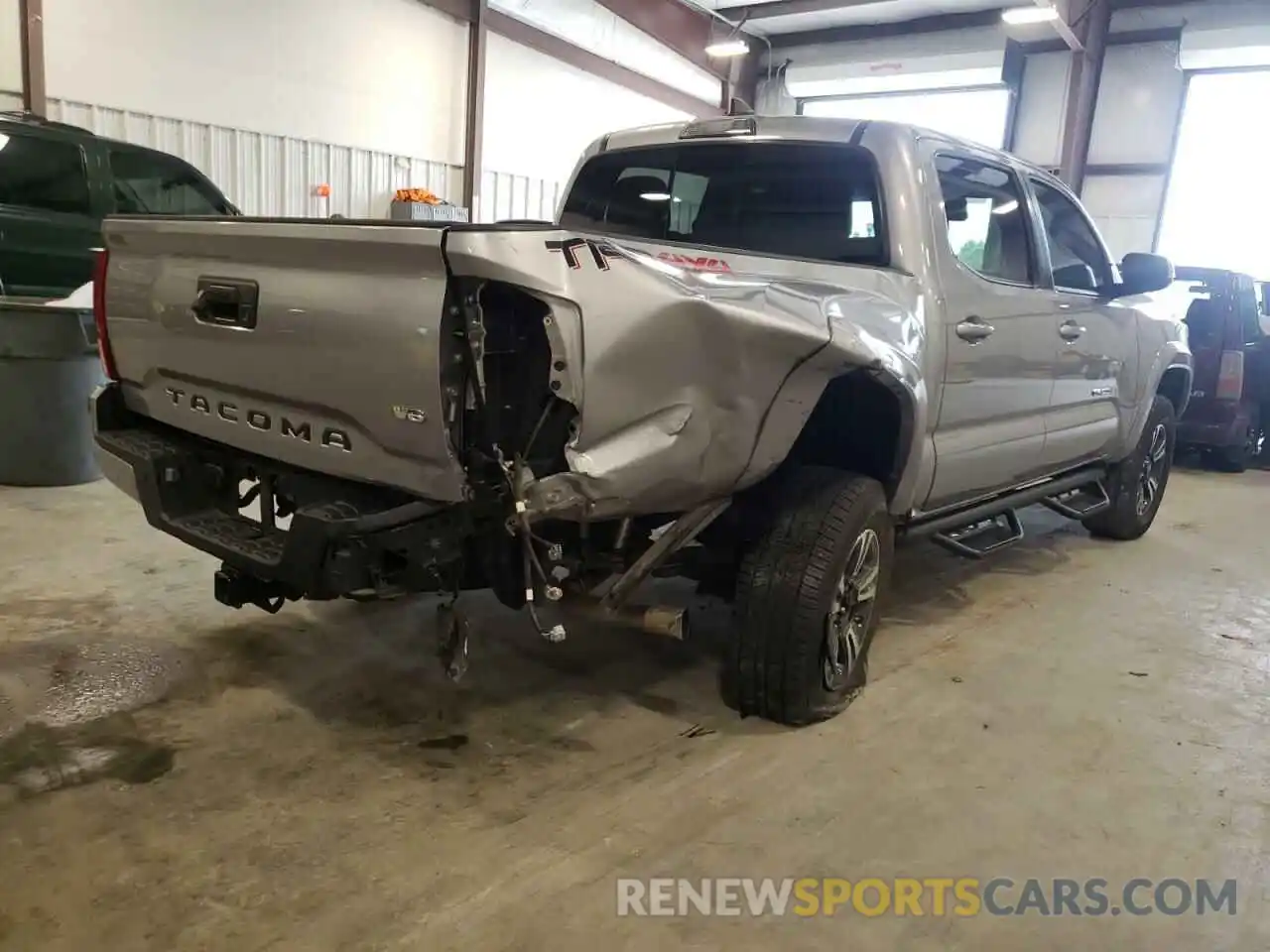 4 Photograph of a damaged car 5TFCZ5AN8KX192353 TOYOTA TACOMA 2019