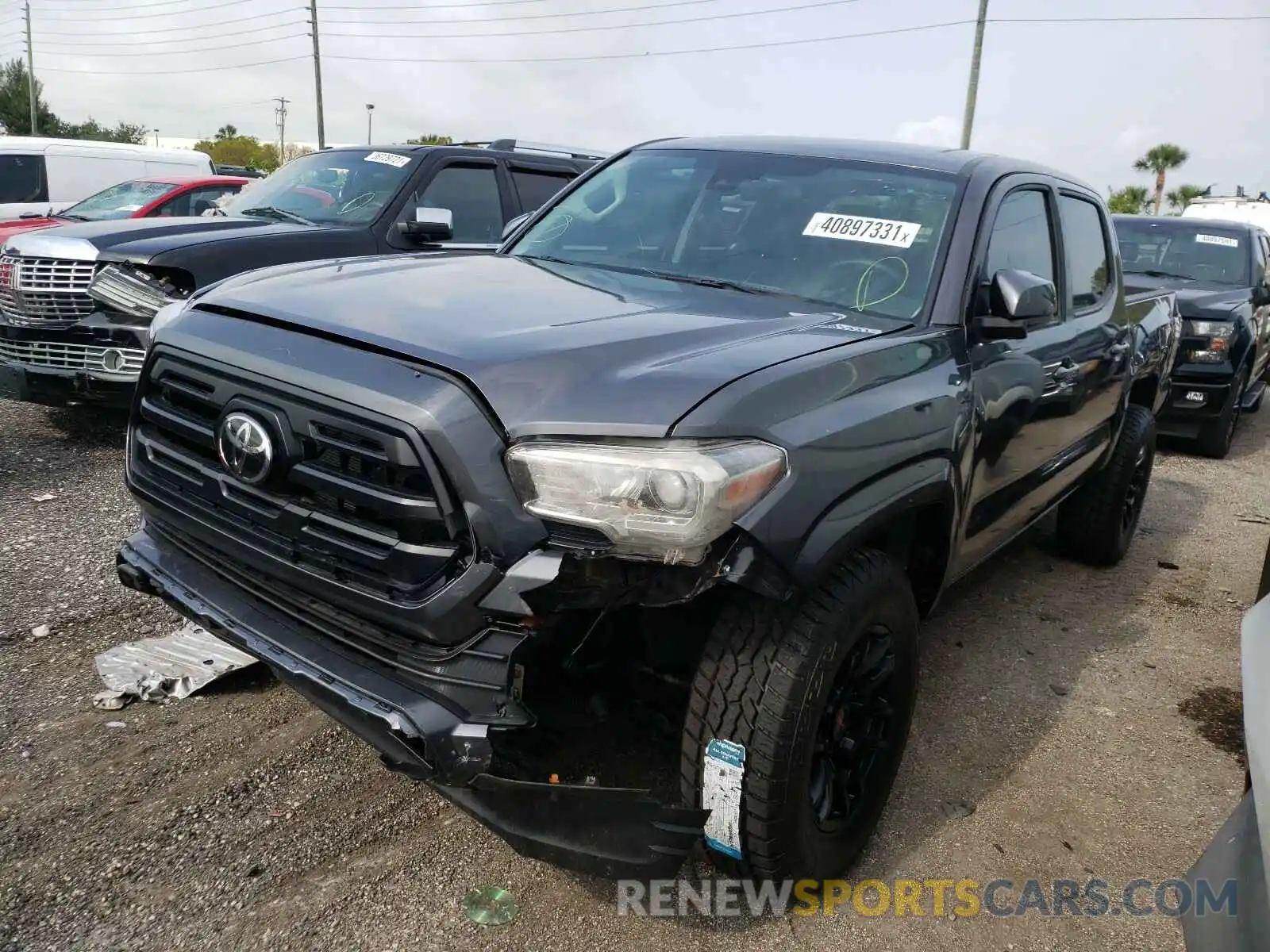 2 Photograph of a damaged car 5TFCZ5AN8KX199299 TOYOTA TACOMA 2019