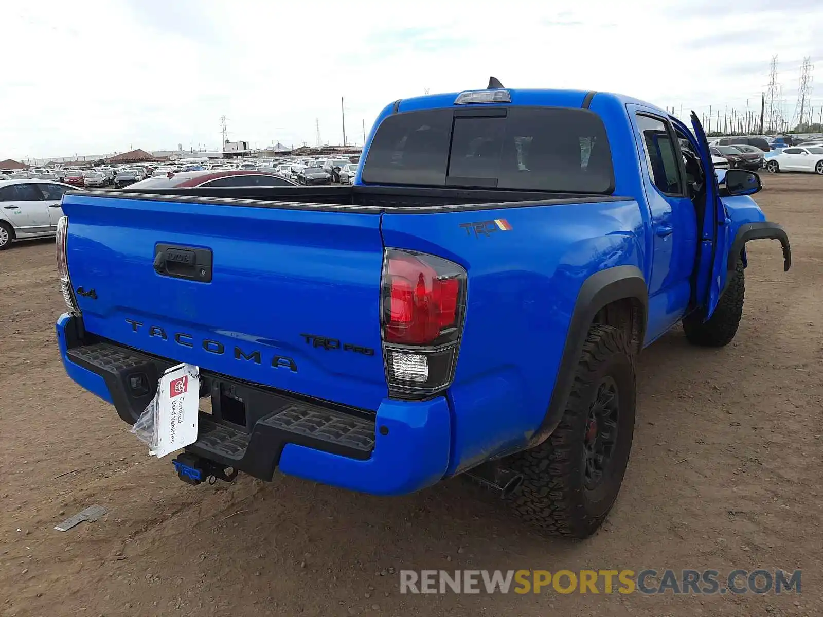 4 Photograph of a damaged car 5TFCZ5AN8KX199982 TOYOTA TACOMA 2019