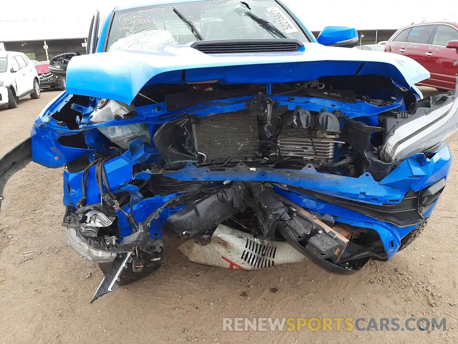 9 Photograph of a damaged car 5TFCZ5AN8KX199982 TOYOTA TACOMA 2019