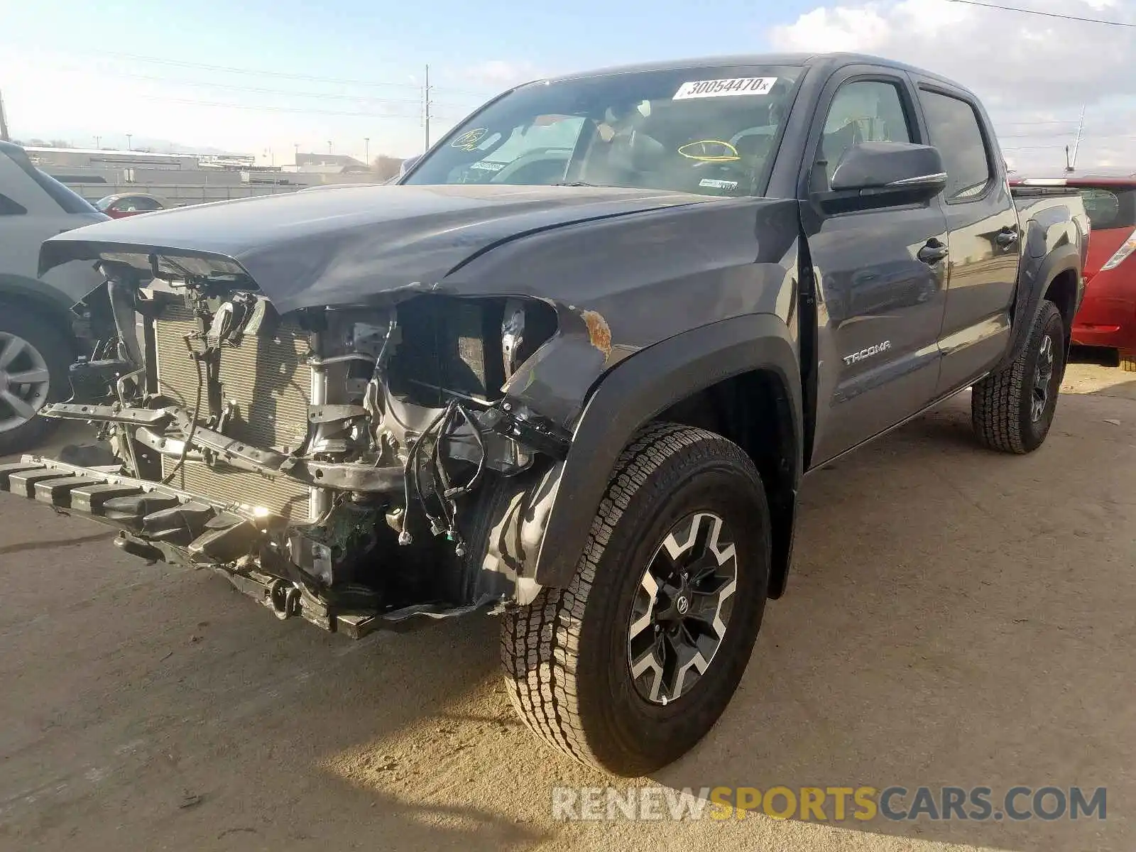 2 Photograph of a damaged car 5TFCZ5AN8KX205893 TOYOTA TACOMA 2019