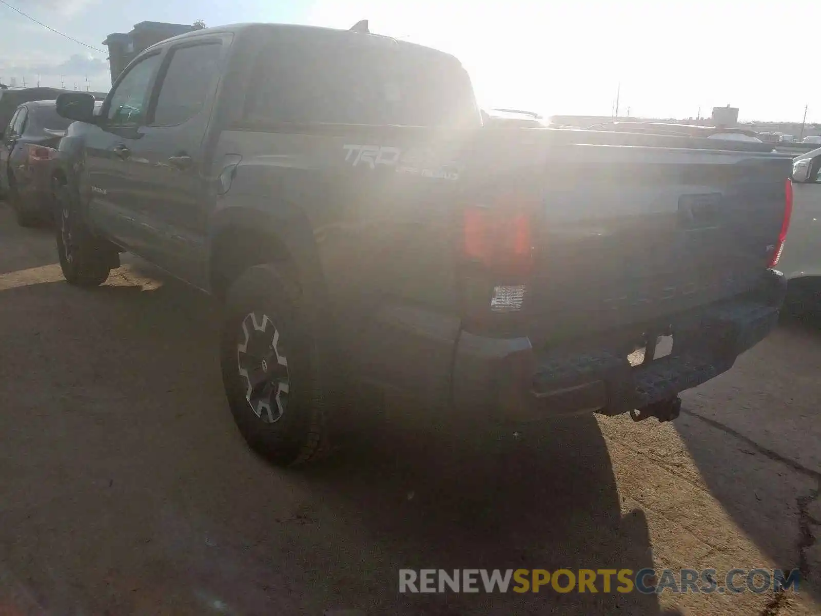 3 Photograph of a damaged car 5TFCZ5AN8KX205893 TOYOTA TACOMA 2019