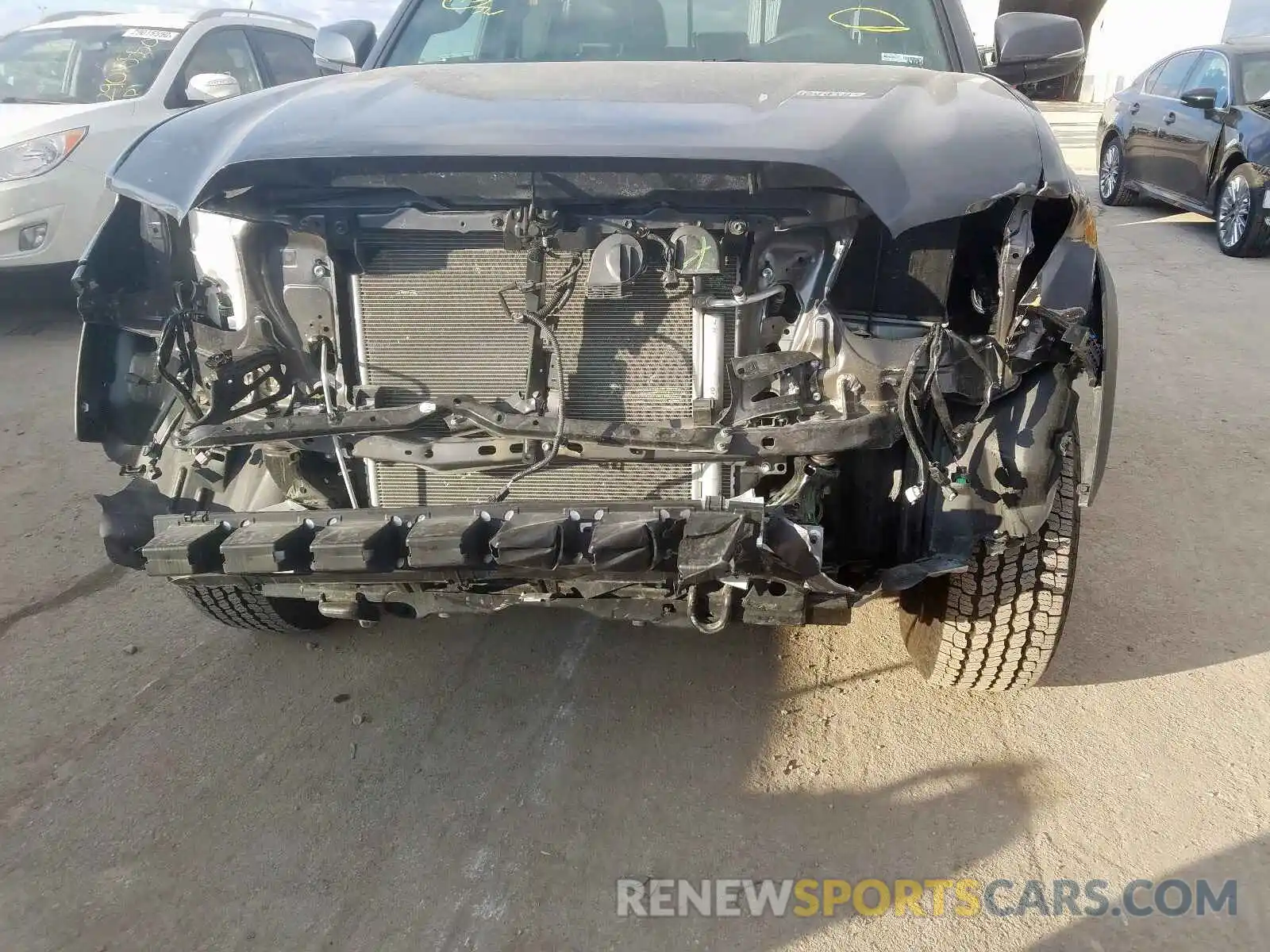 9 Photograph of a damaged car 5TFCZ5AN8KX205893 TOYOTA TACOMA 2019