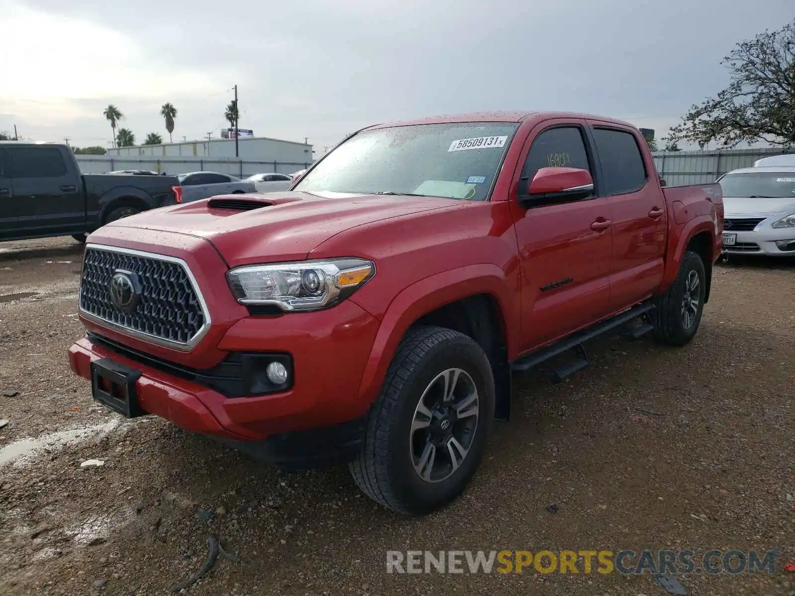 2 Photograph of a damaged car 5TFCZ5AN8KX206574 TOYOTA TACOMA 2019