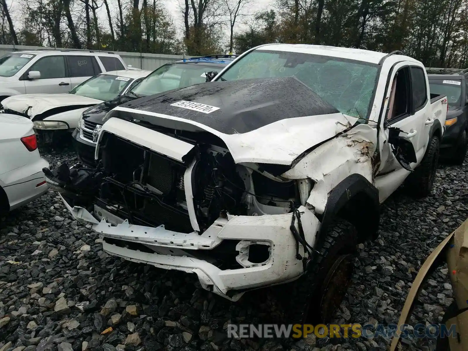 2 Photograph of a damaged car 5TFCZ5AN8KX207000 TOYOTA TACOMA 2019