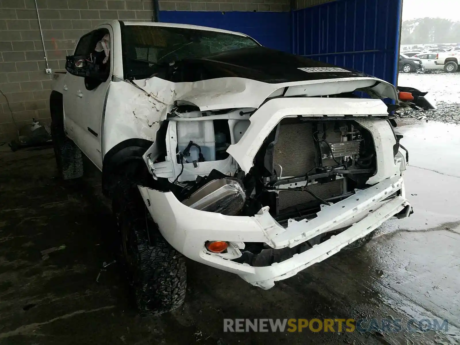 9 Photograph of a damaged car 5TFCZ5AN8KX207000 TOYOTA TACOMA 2019